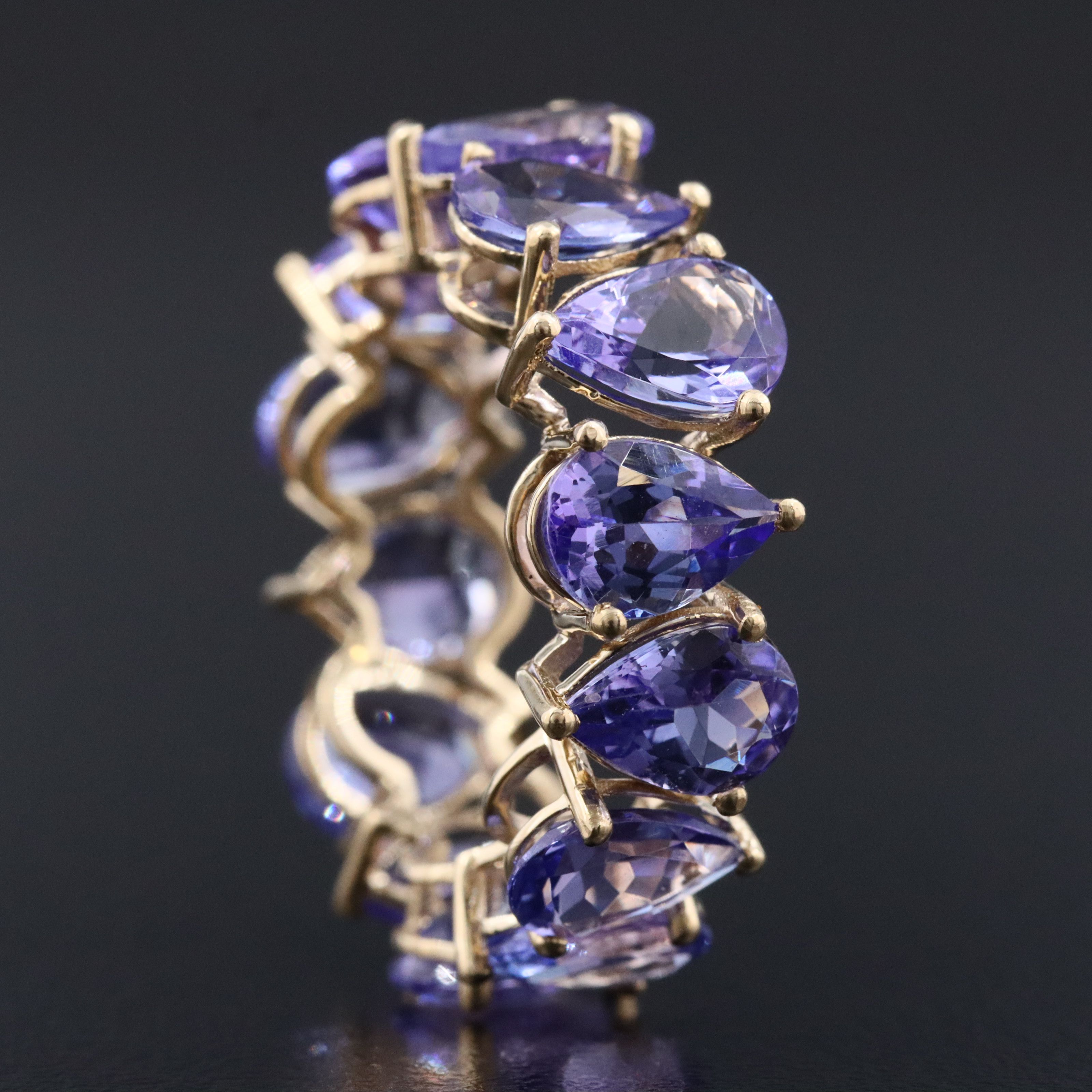 14K 8.37 CTW Tanzanite Eternity Band