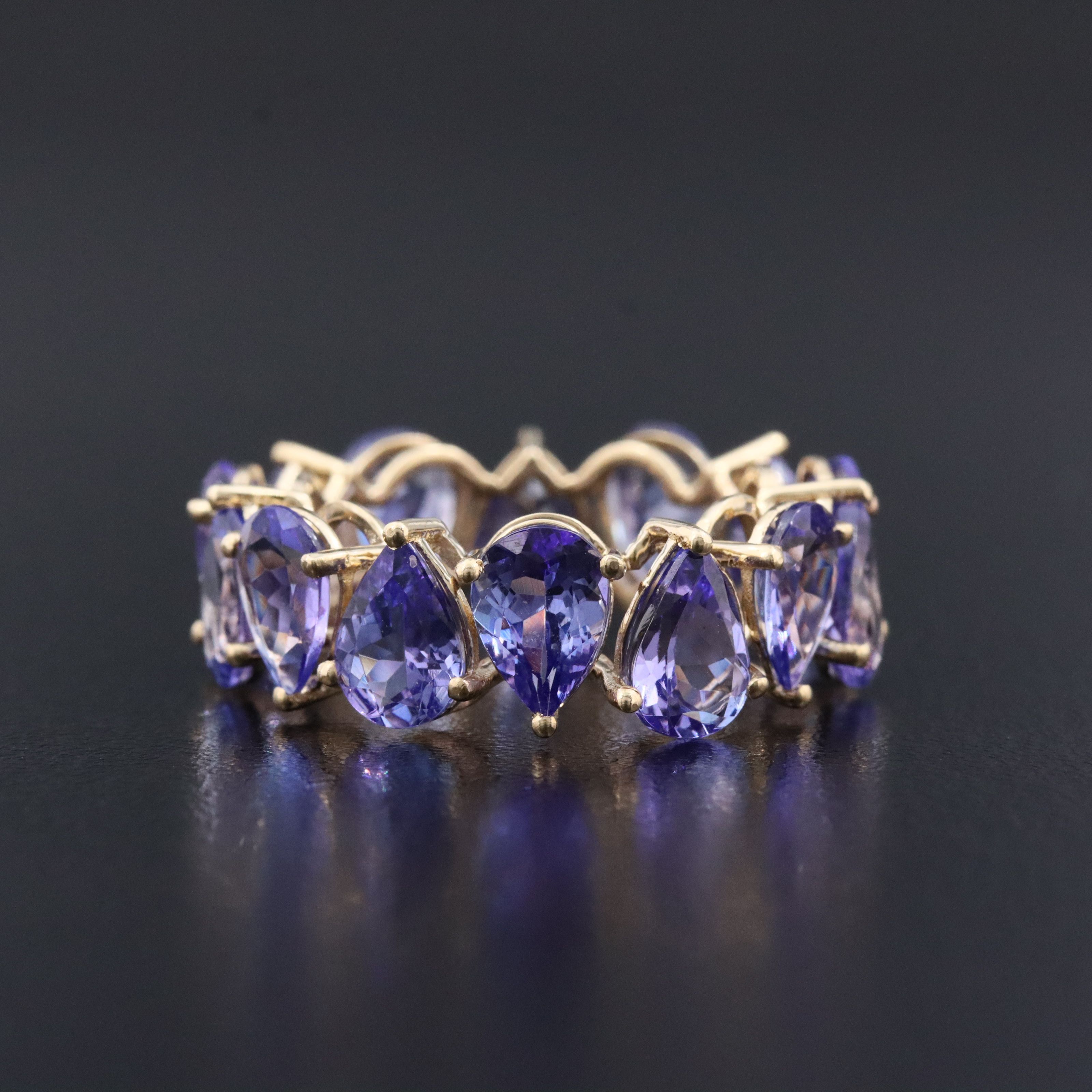 14K 8.37 CTW Tanzanite Eternity Band