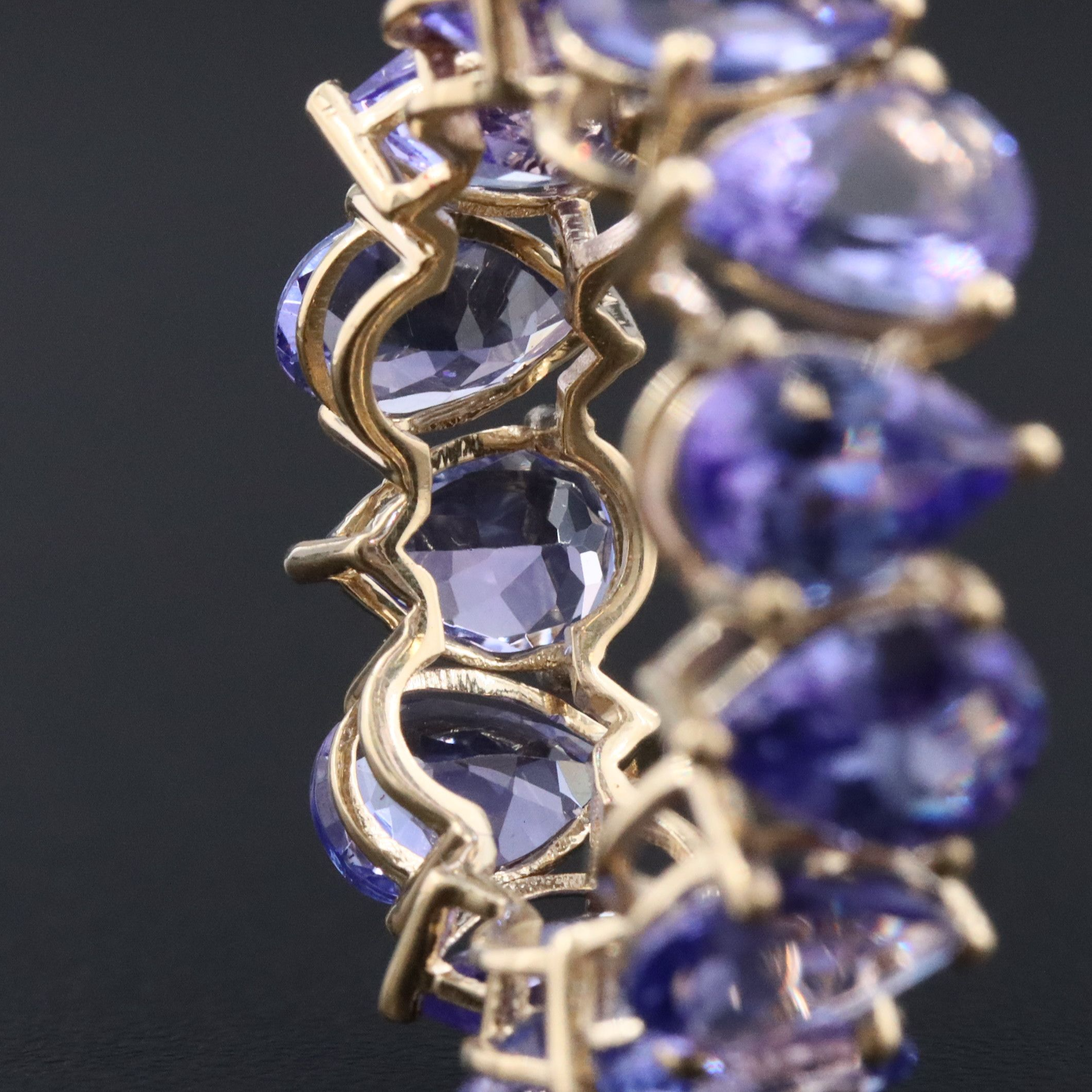 14K 8.37 CTW Tanzanite Eternity Band
