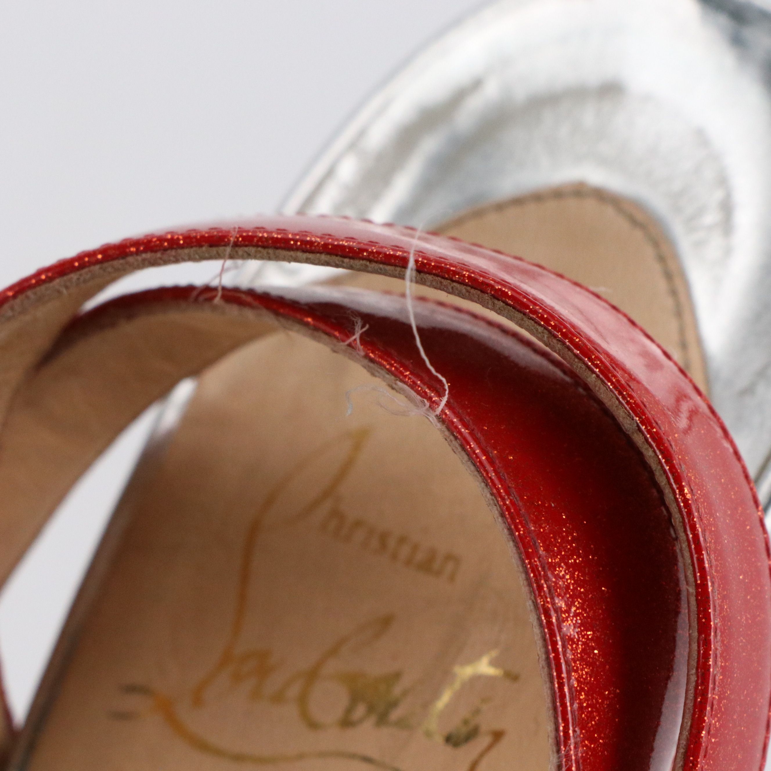 Christian Louboutin Peep Toe Ankle Strap Pumps in Red Glittered Patent Leather