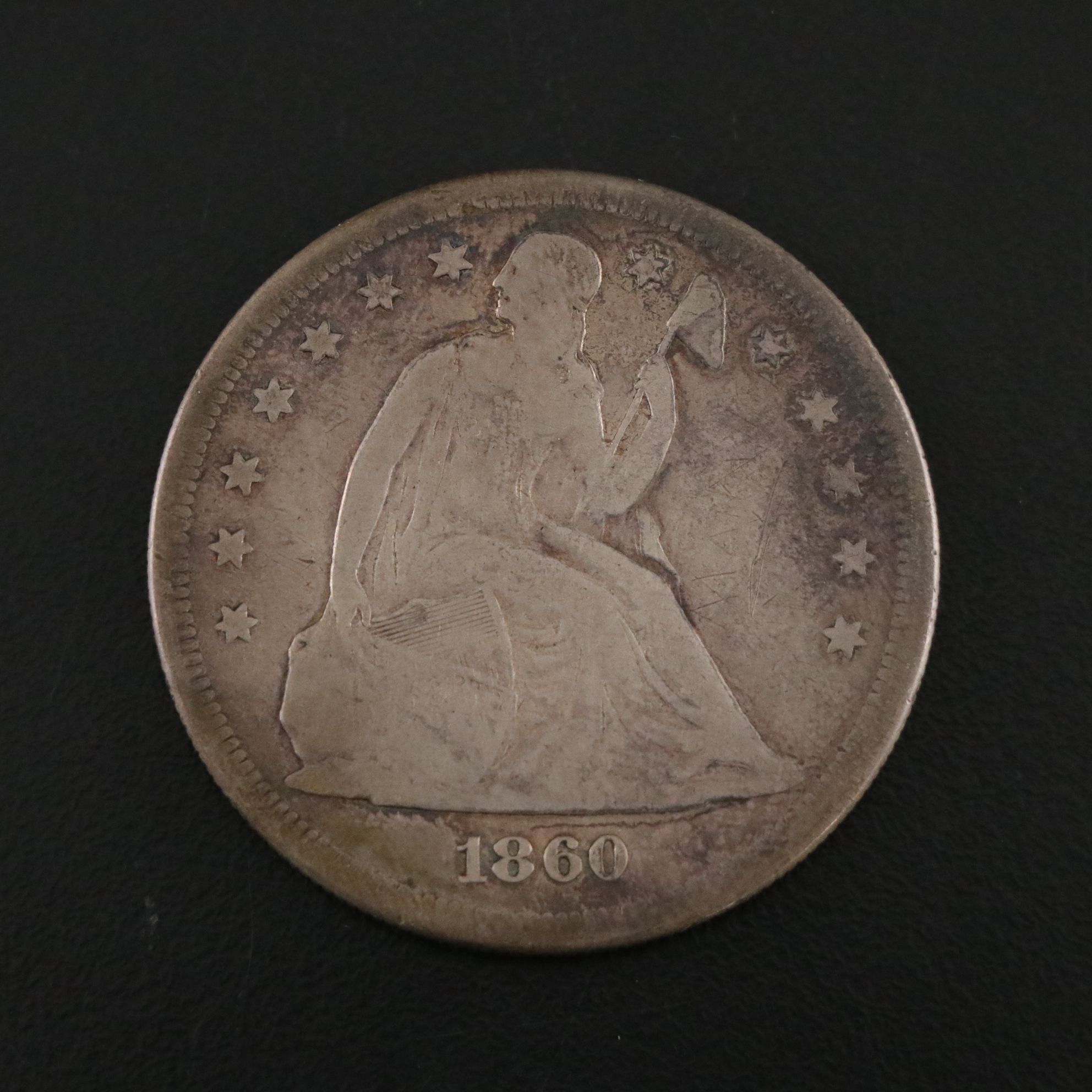 1860-O U.S. Seated Liberty Silver Dollar