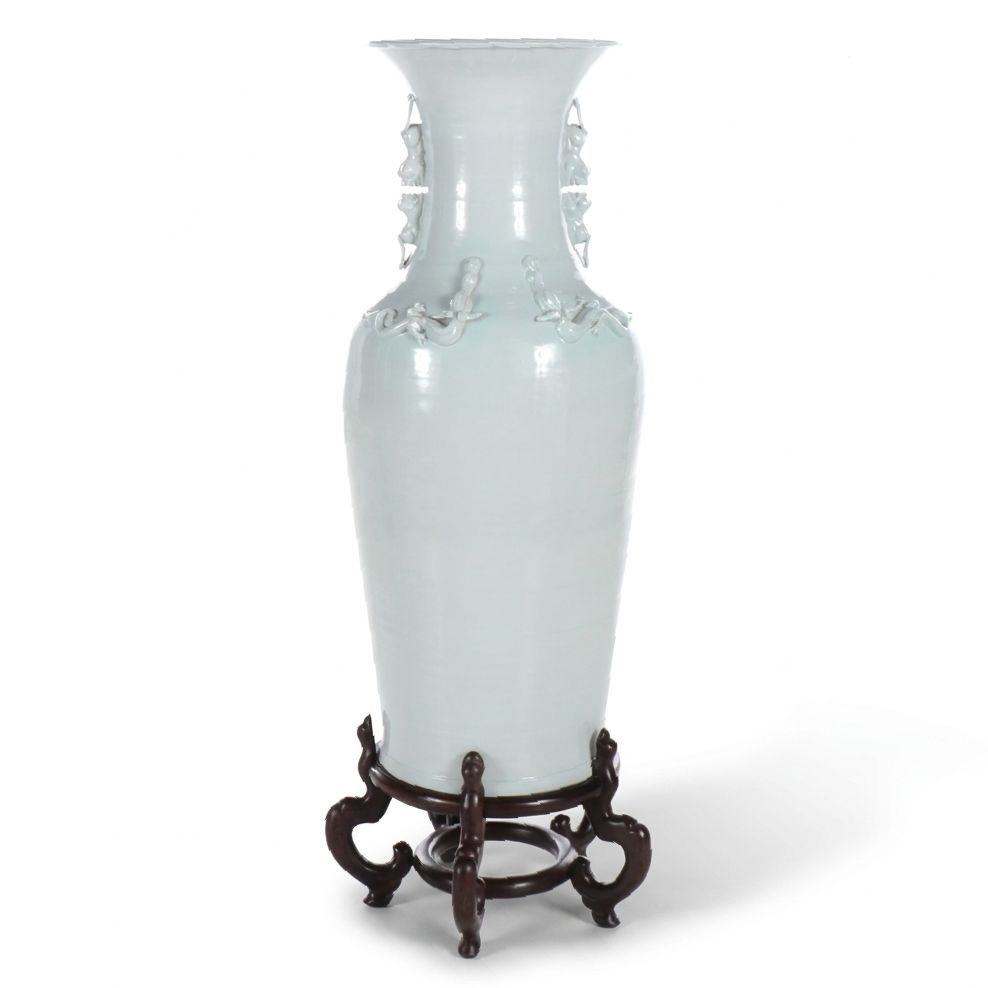 Chinese Blanc de Chine Vase with Guardian Lion Handles and Relief Dragons