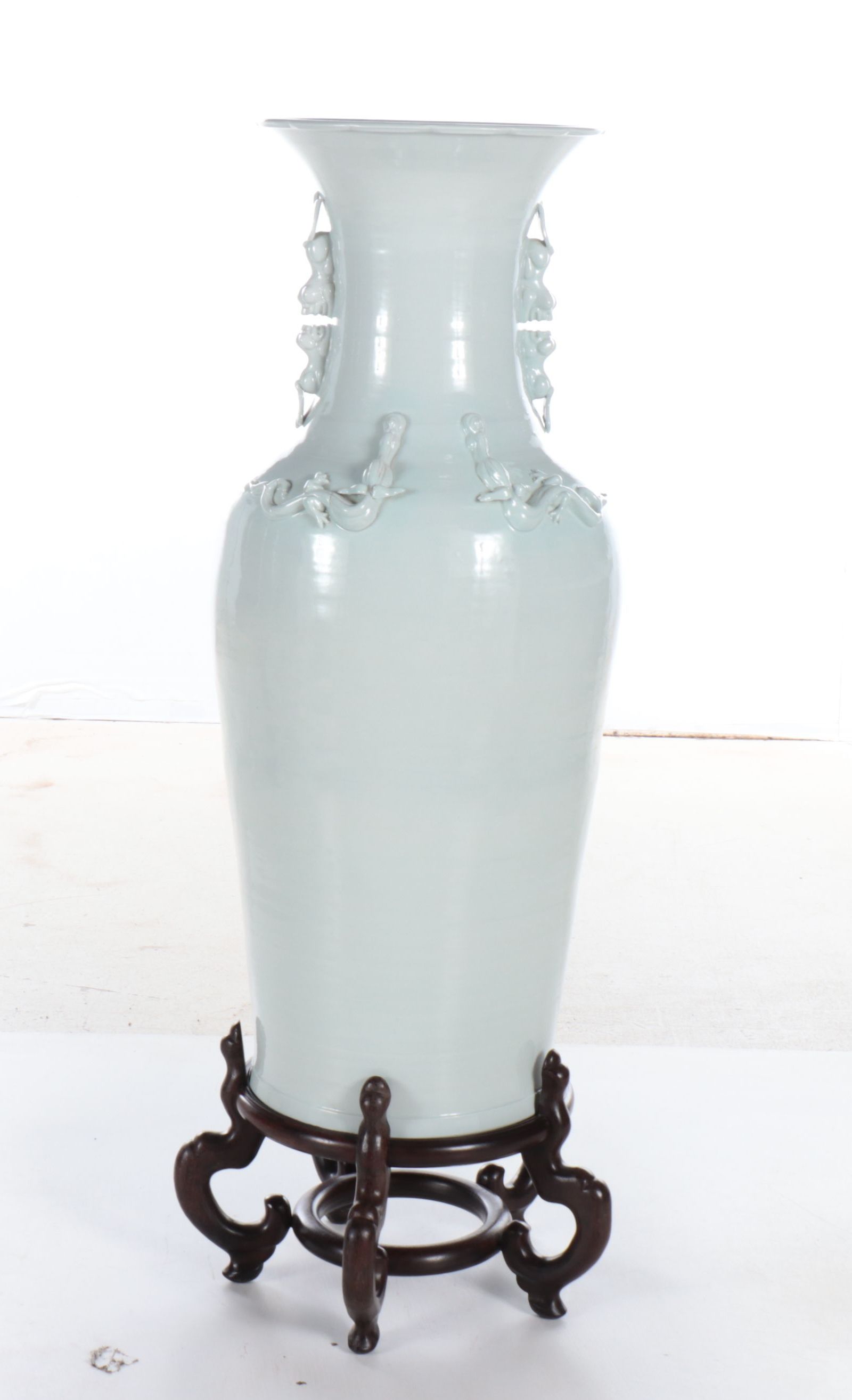 Chinese Blanc de Chine Vase with Guardian Lion Handles and Relief Dragons