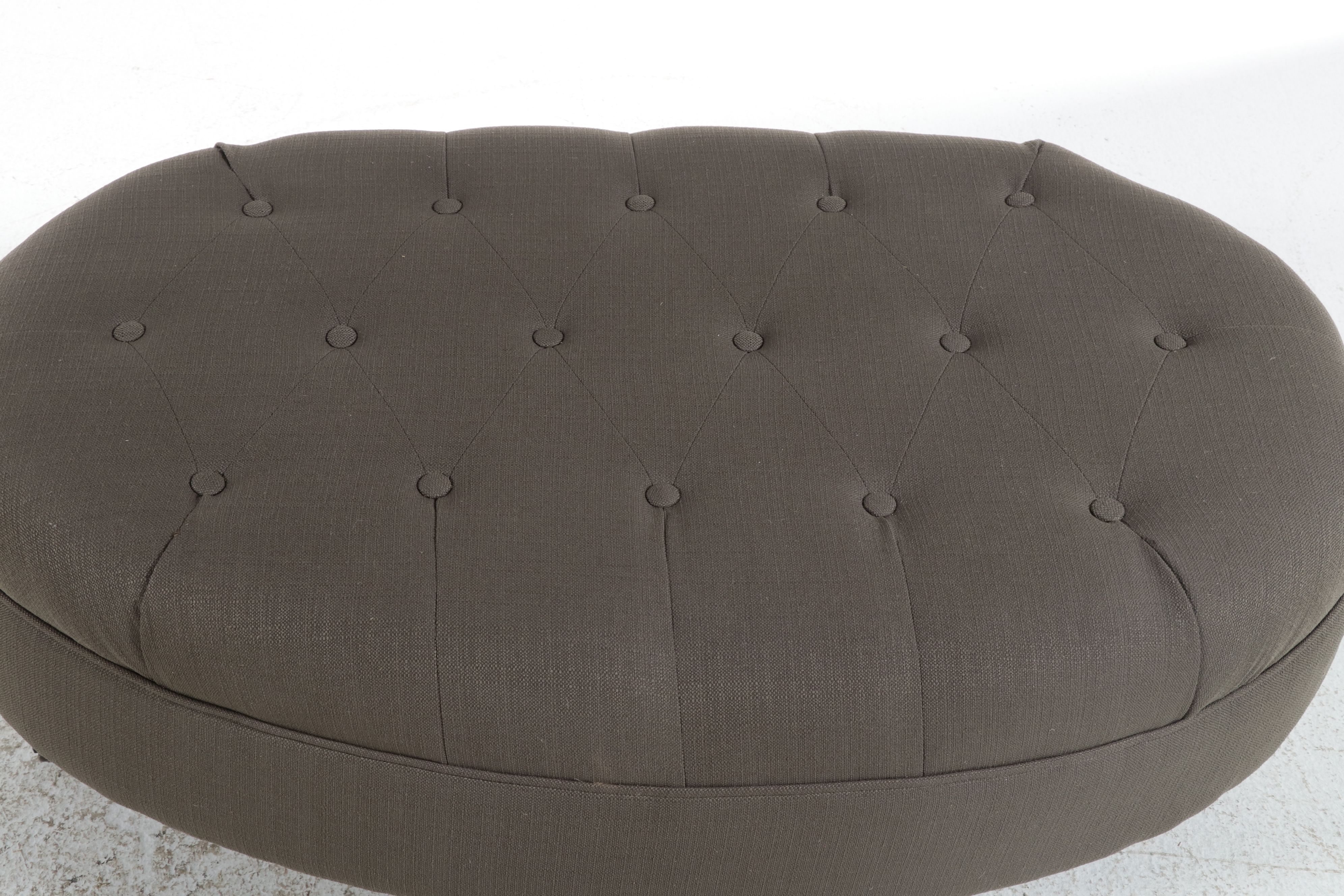 At Home Tufted Oval Cocktail Ottoman, 21st Century