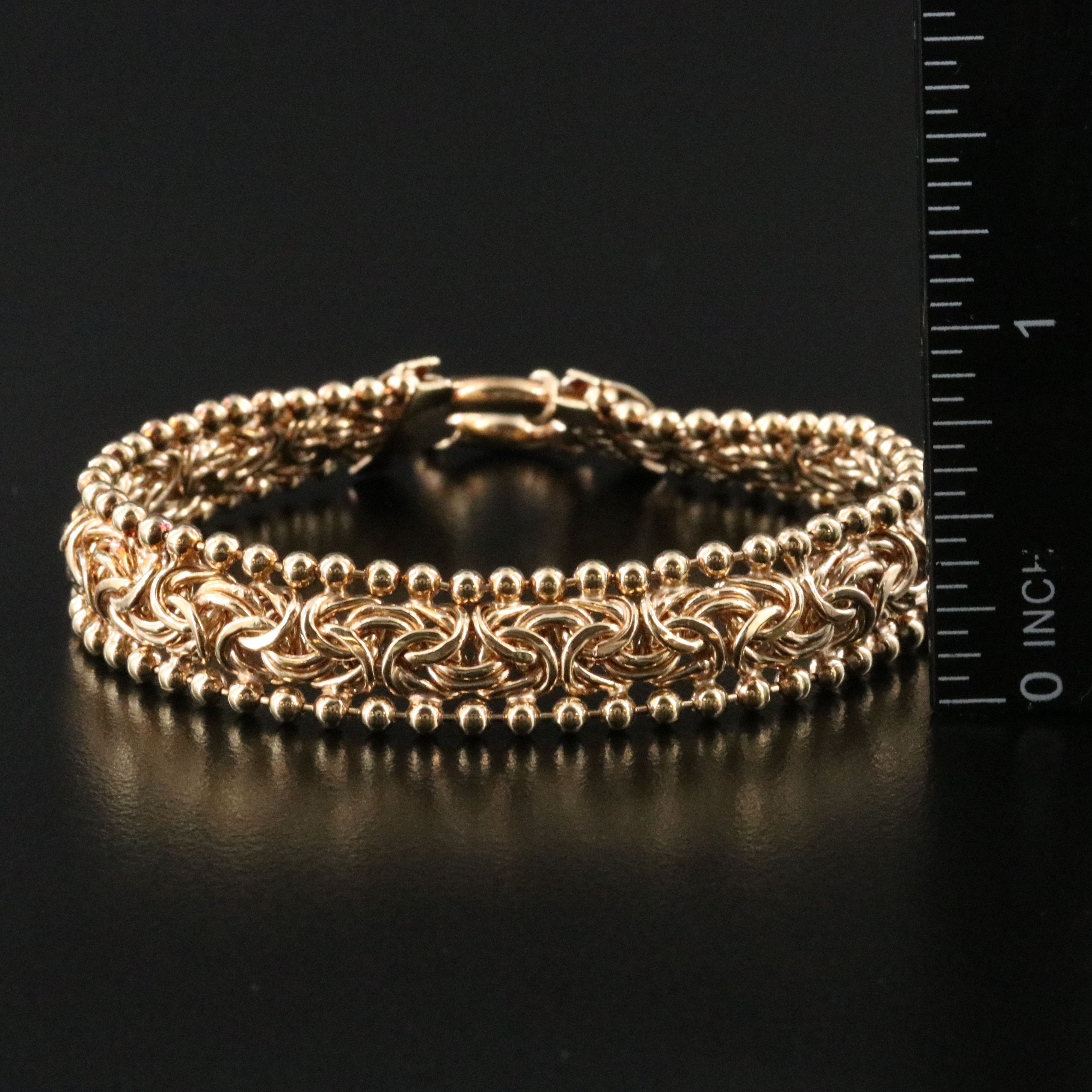 Sterling Fancy Link Bracelets Featuring Rubies