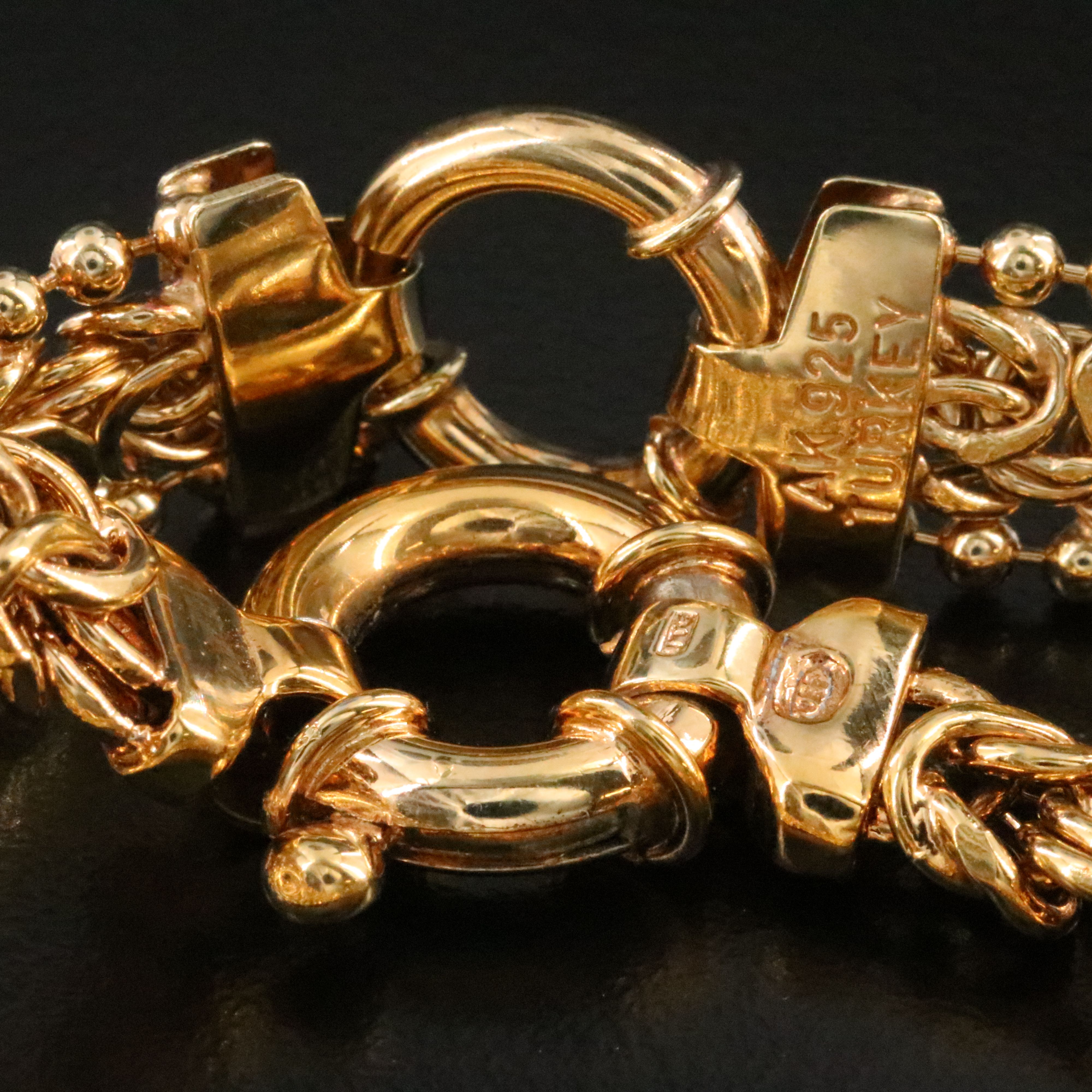 Sterling Fancy Link Bracelets Featuring Rubies