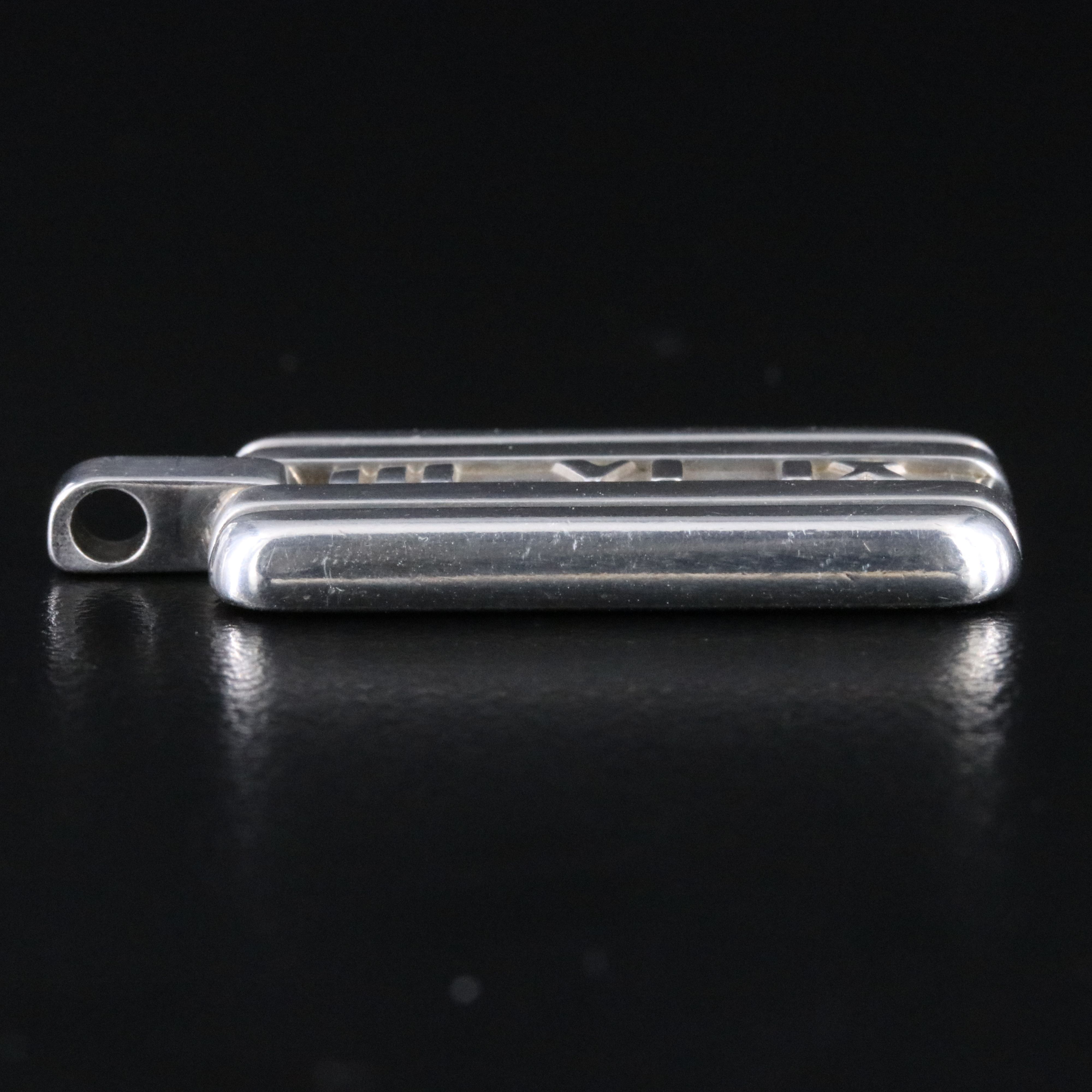 Tiffany & Co. Atlas Sterling Dog Tag Pendant