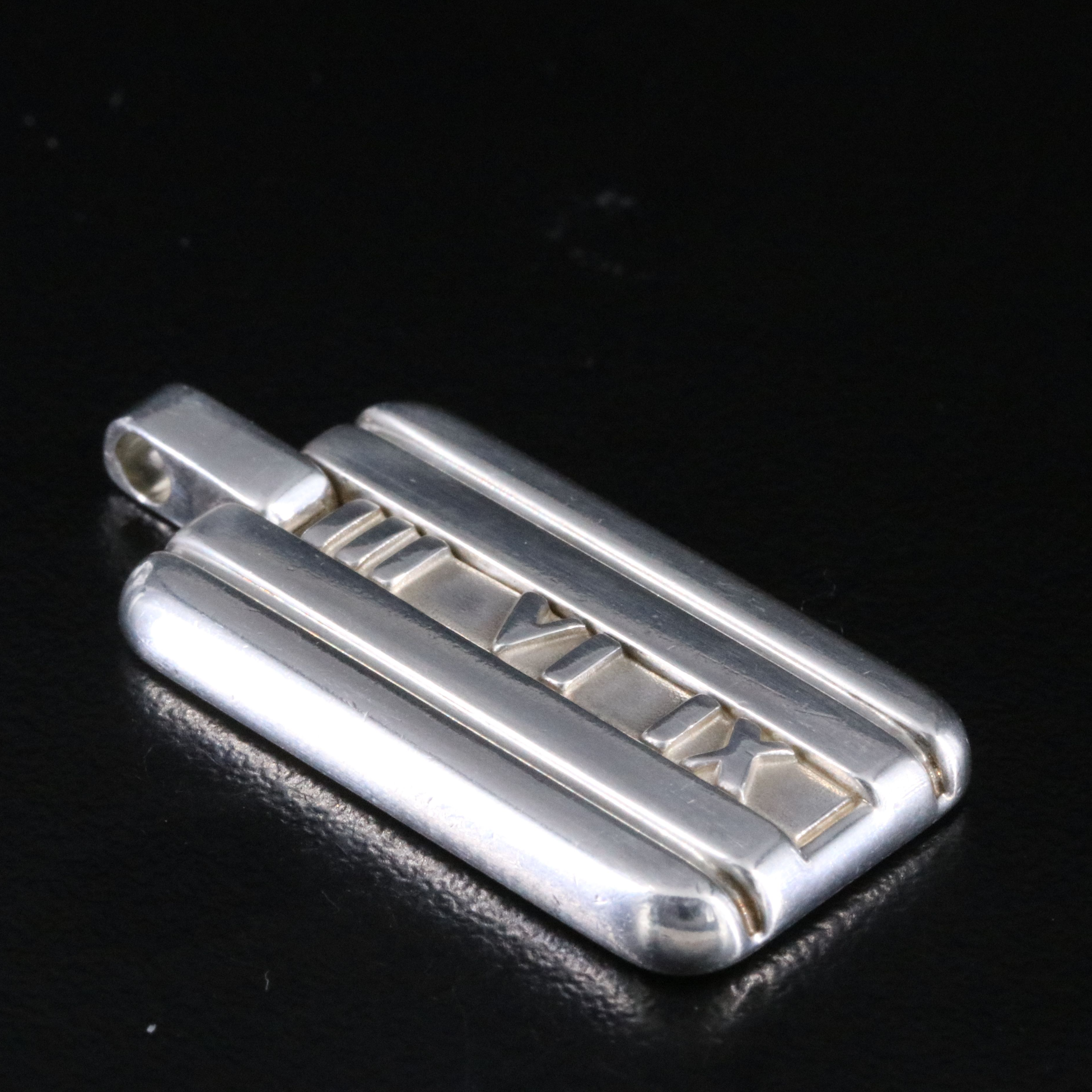 Tiffany & Co. Atlas Sterling Dog Tag Pendant