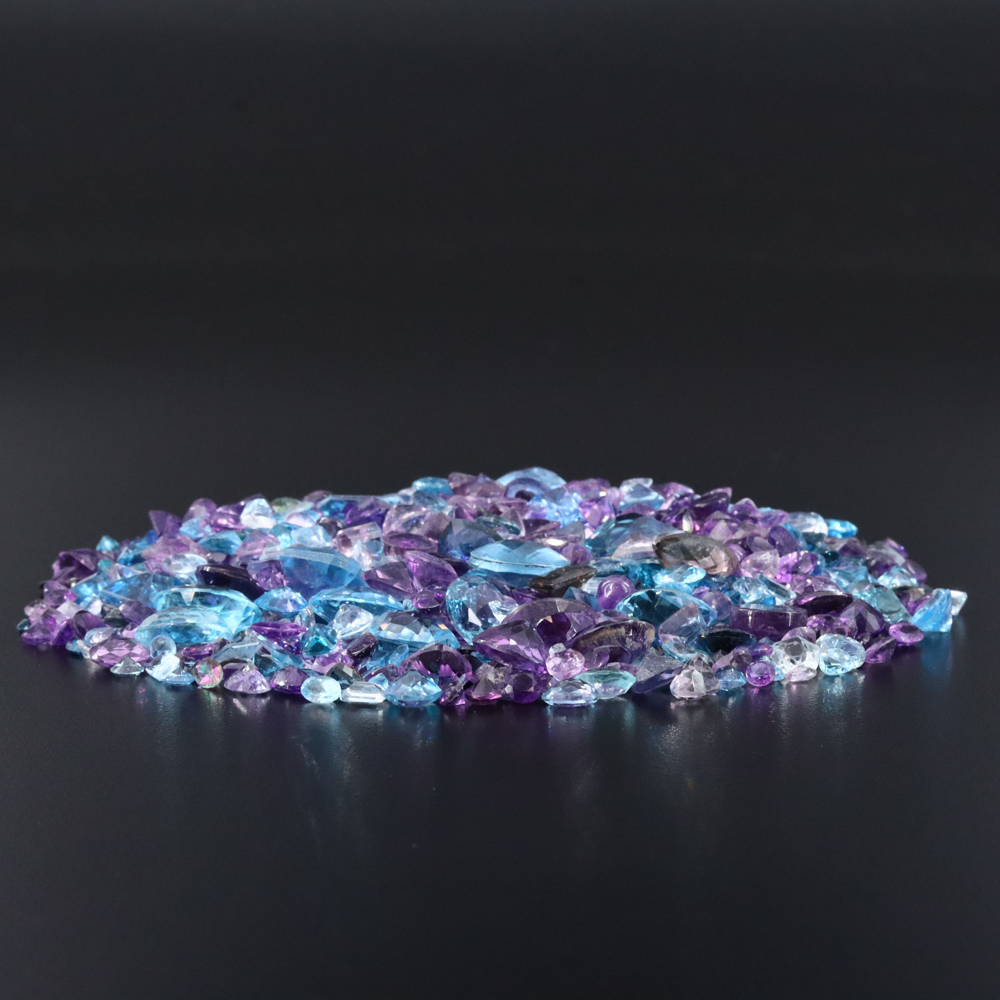 Loose 1022.00 CTW Gemstones Featuring Topaz, Amethyst and Smoky Quartz