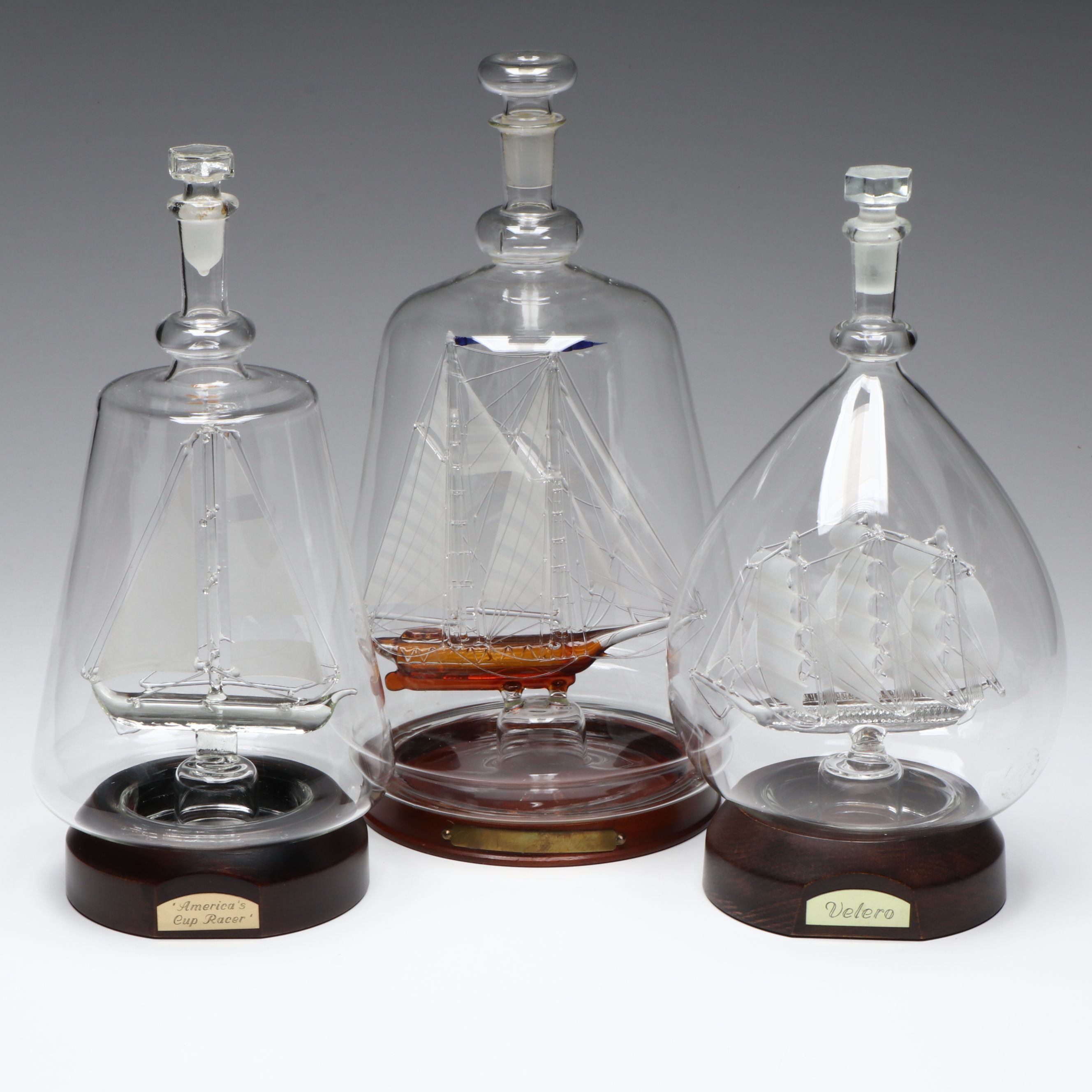 "America's Cup Racer," "Velero," and More Ship in a Bottle Glass Models