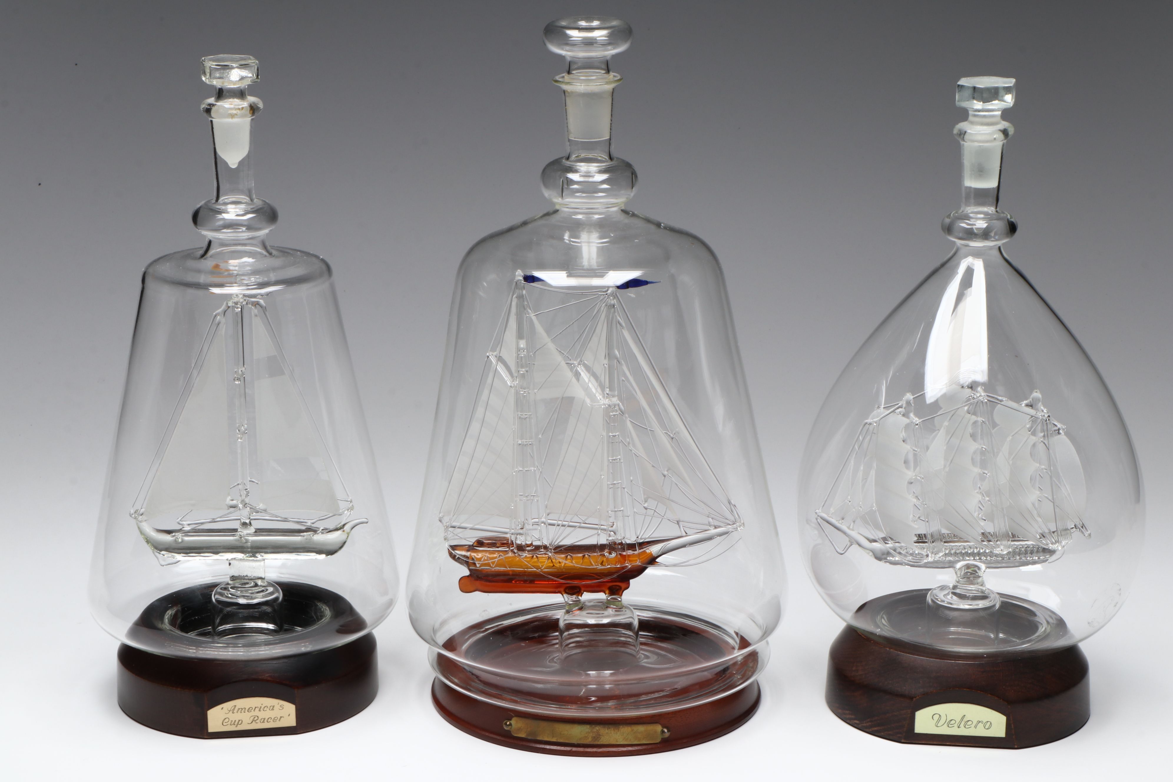 "America's Cup Racer," "Velero," and More Ship in a Bottle Glass Models