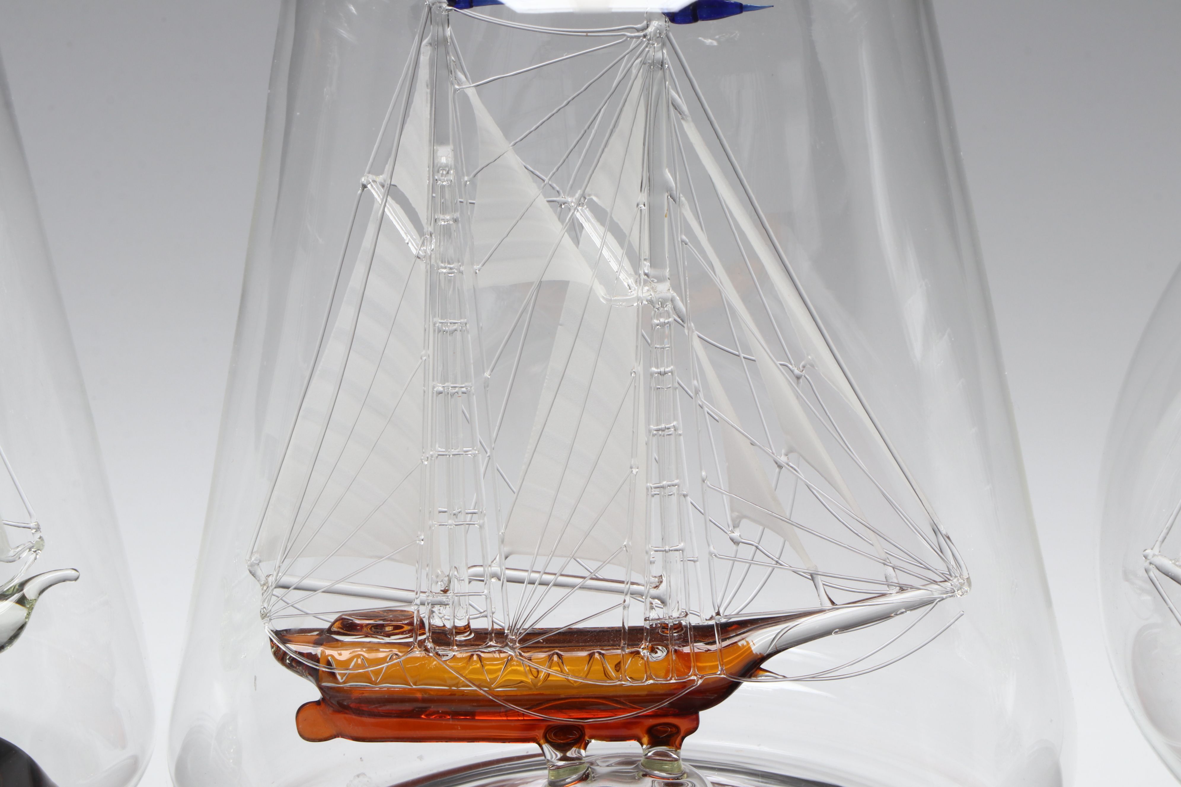 "America's Cup Racer," "Velero," and More Ship in a Bottle Glass Models