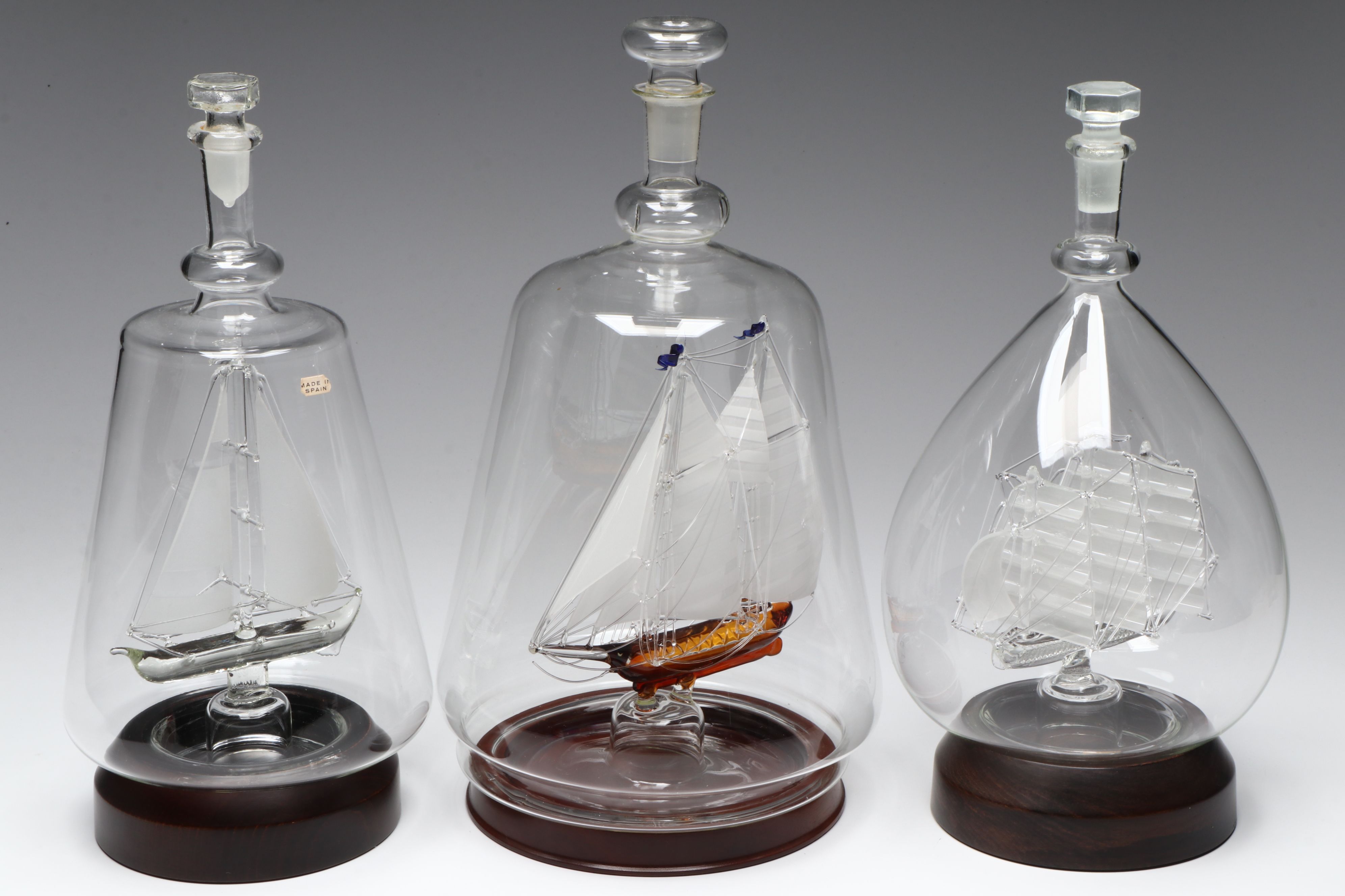 "America's Cup Racer," "Velero," and More Ship in a Bottle Glass Models
