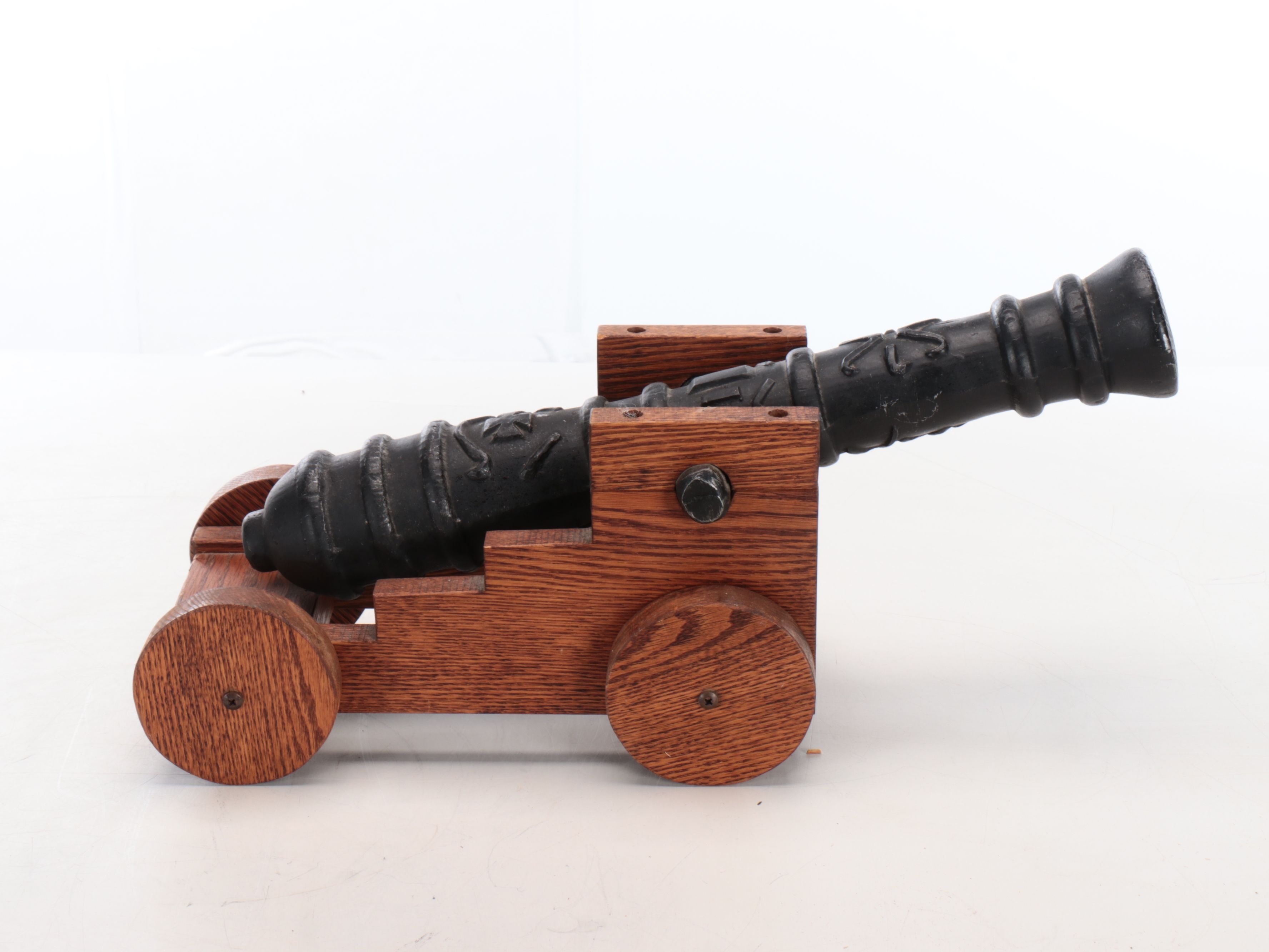 Miniature Cast Metal Cannon with Wooden Rolling Base