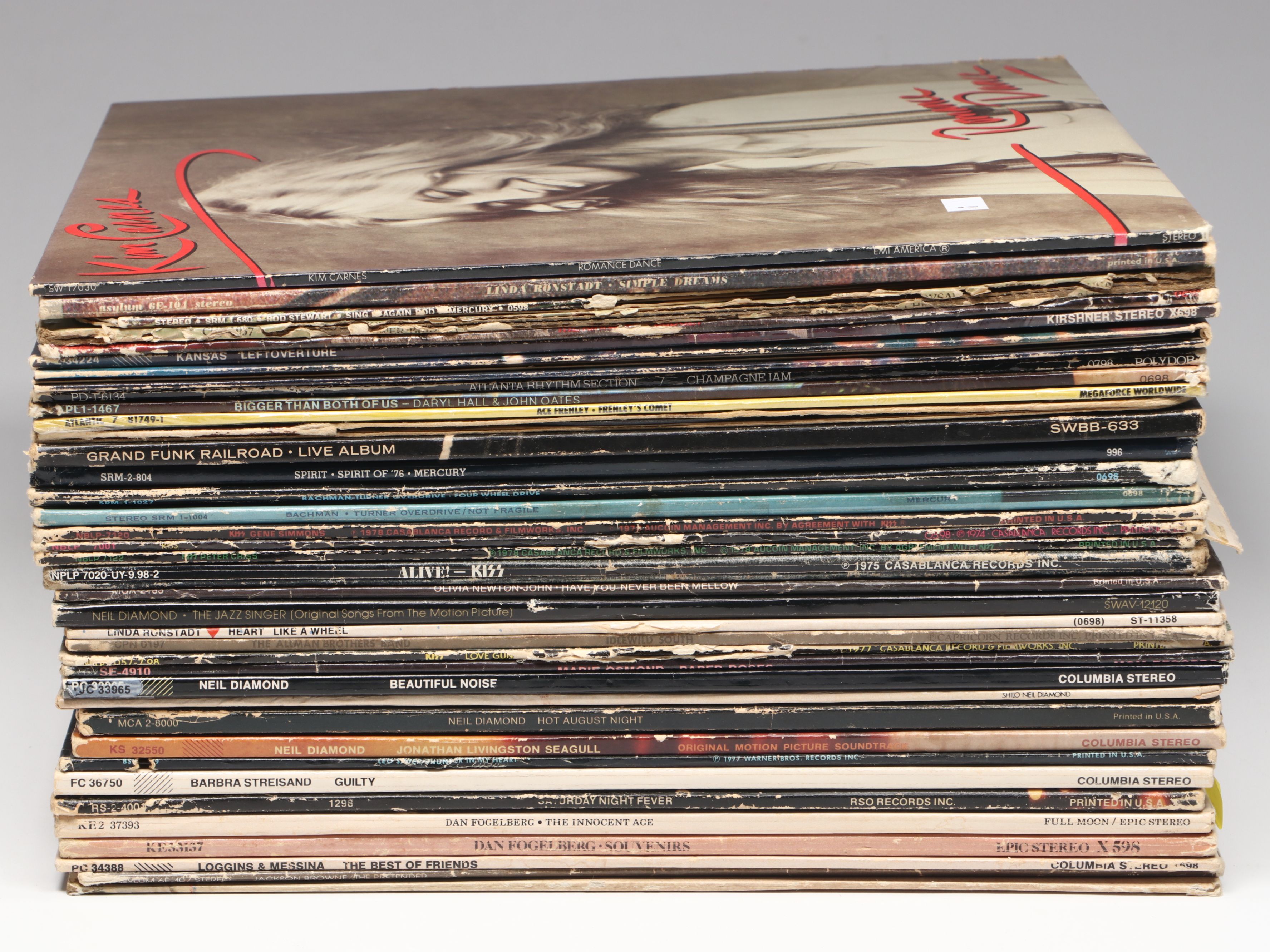 Olivia Newton-John, Kiss, Neil Diamond, and More Vinyl Record Albums