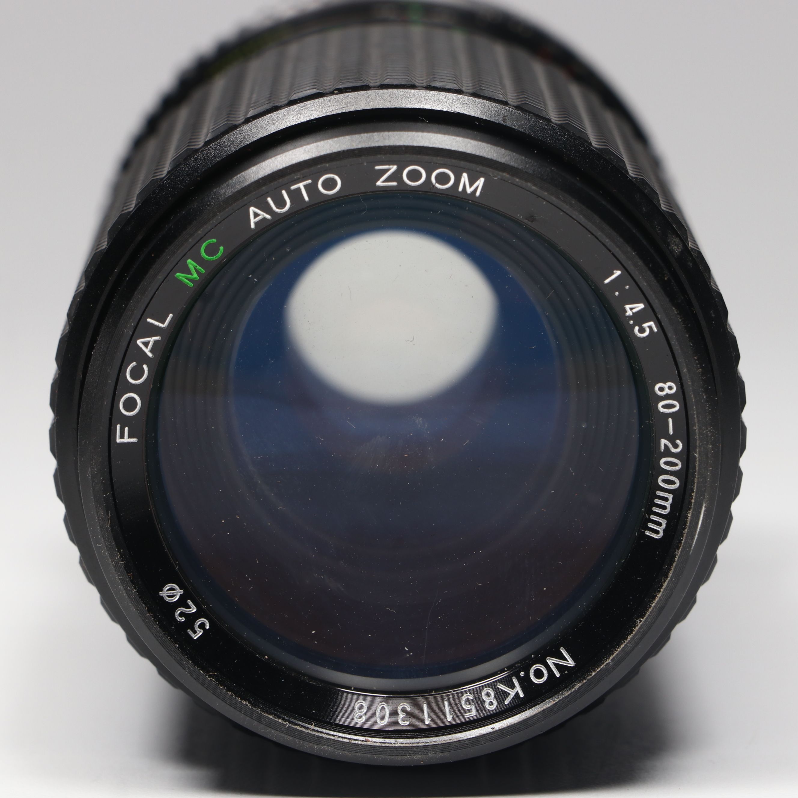 Vivitar 70–210 mm f/4.5 Macro Lens with More Camera Lenses
