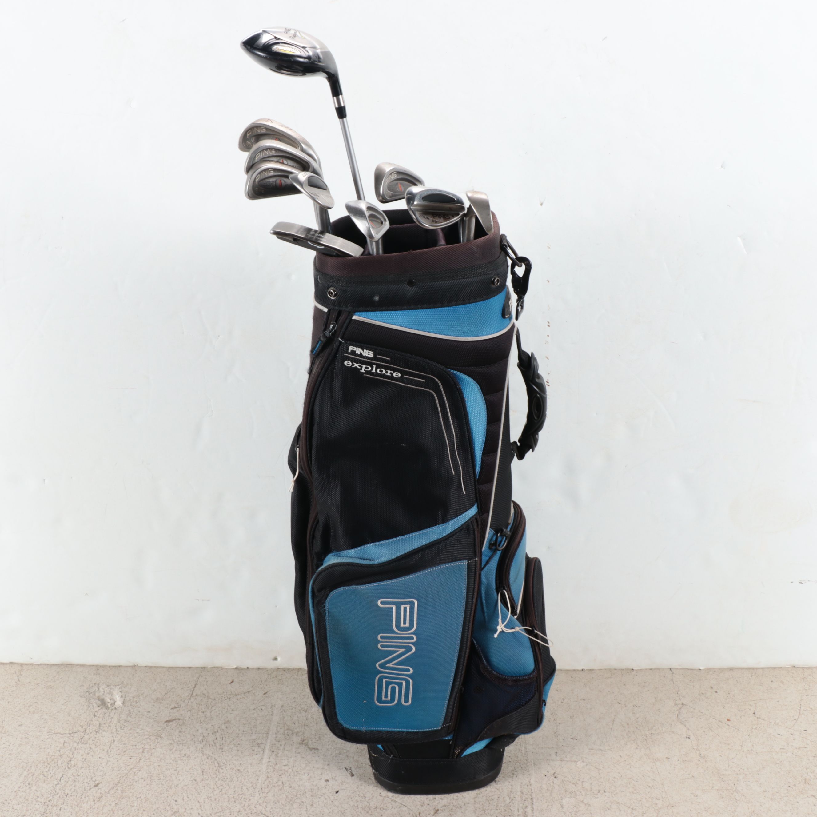 Karsten "Ping" Driver and Putters with Other Golf Clubs