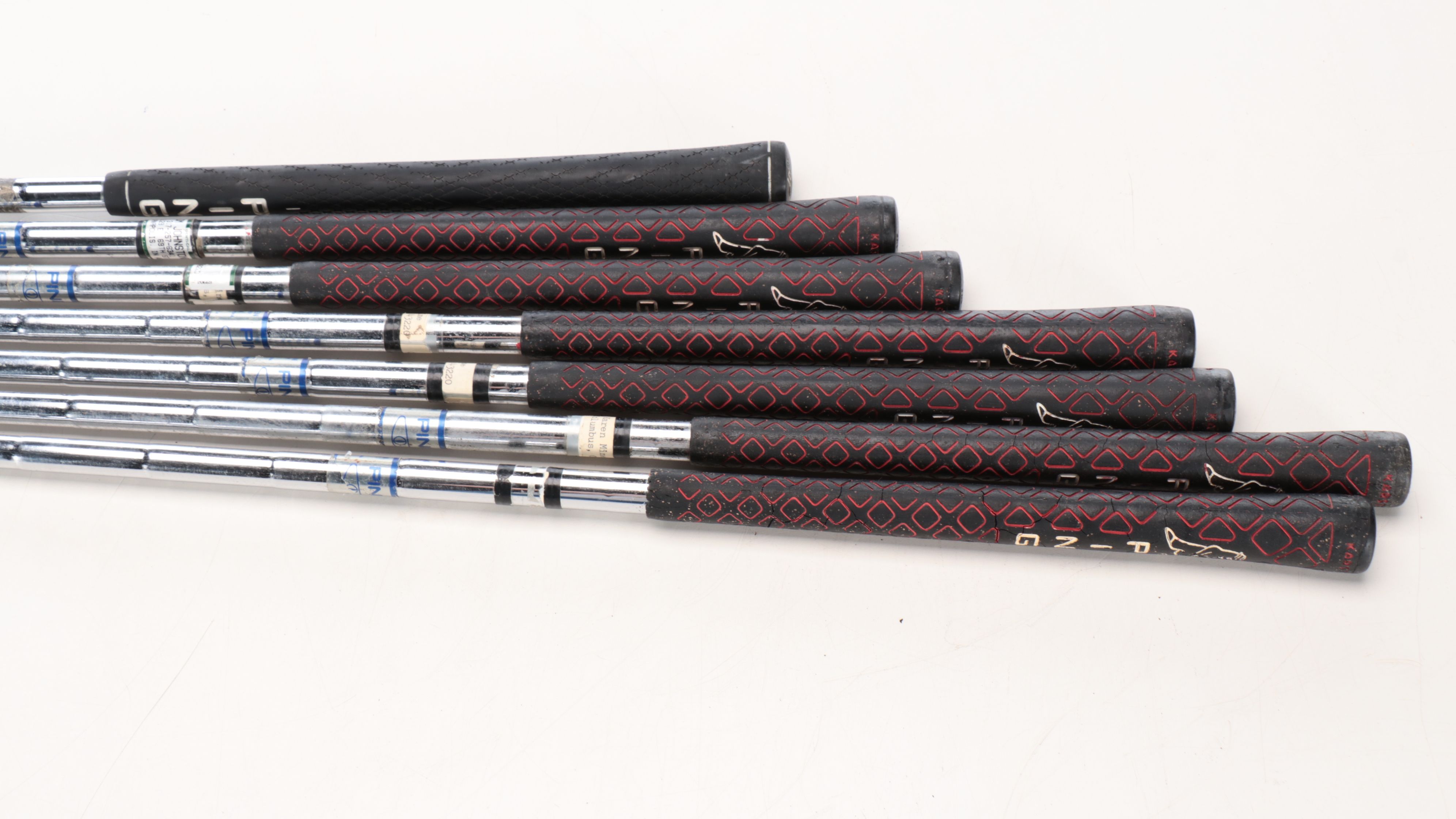 Karsten "Ping" Driver and Putters with Other Golf Clubs