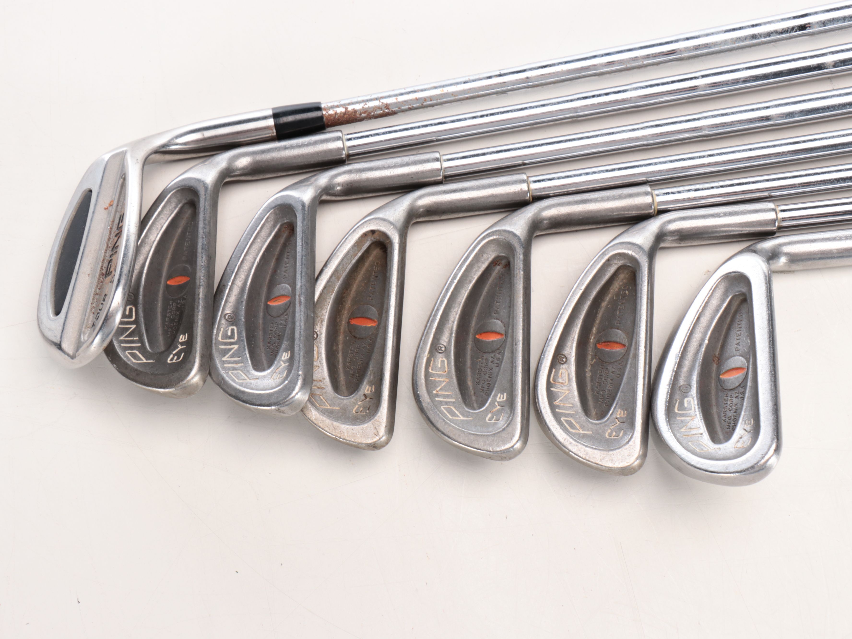 Karsten "Ping" Driver and Putters with Other Golf Clubs