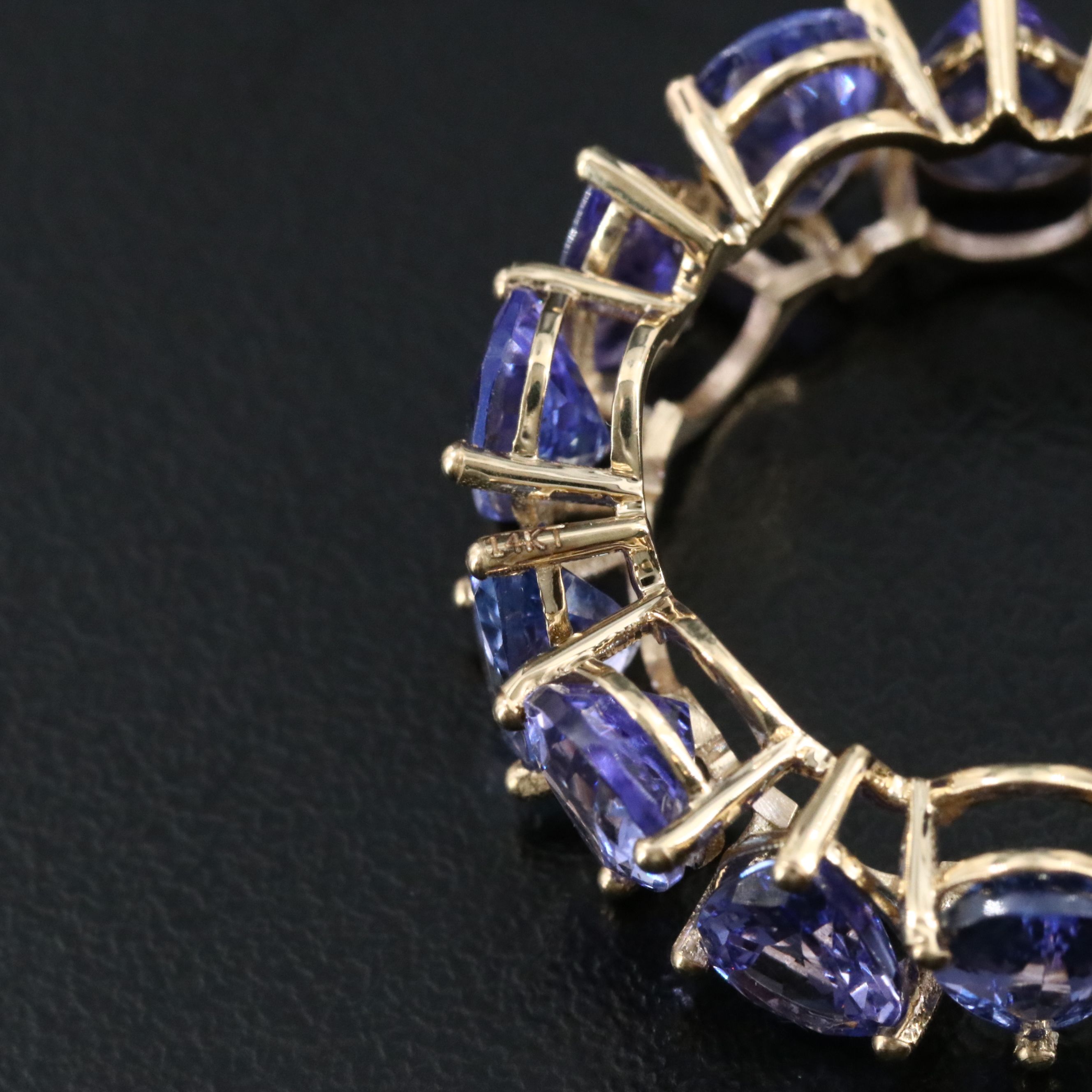14K 9.97 CTW Tanzanite Eternity Band