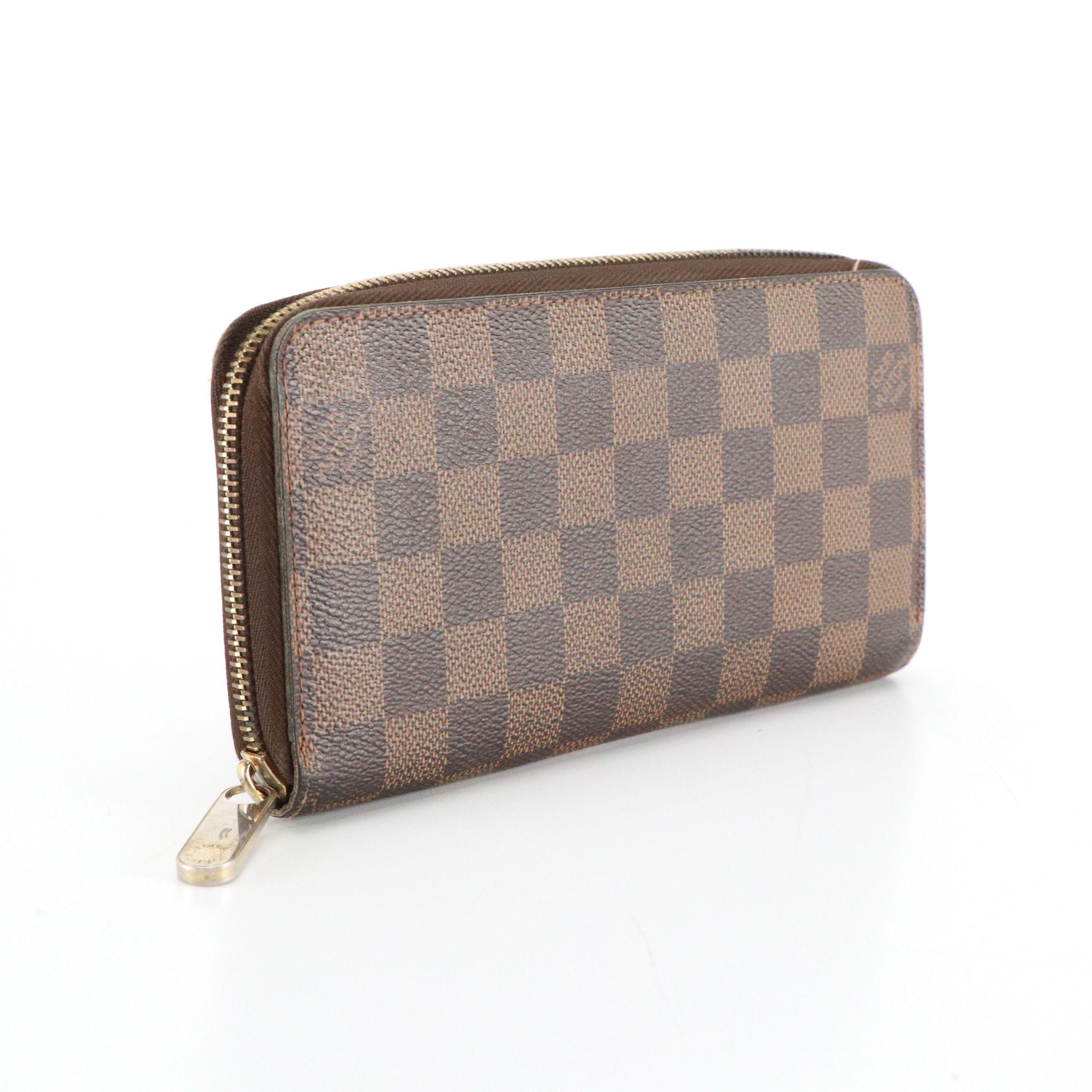 Louis Vuitton Zippy Wallet in Damier Ebene Canvas and Leather