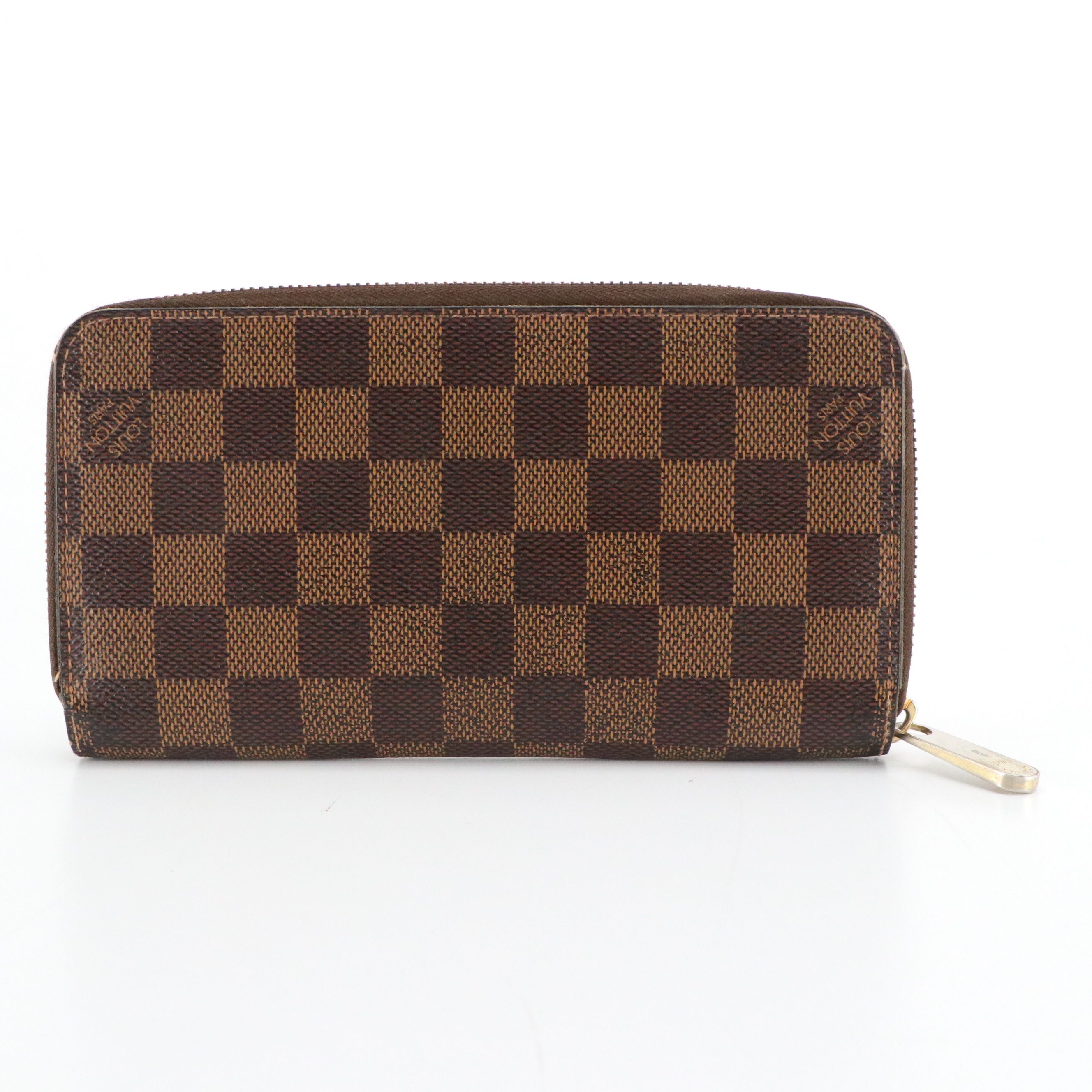 Louis Vuitton Zippy Wallet in Damier Ebene Canvas and Leather