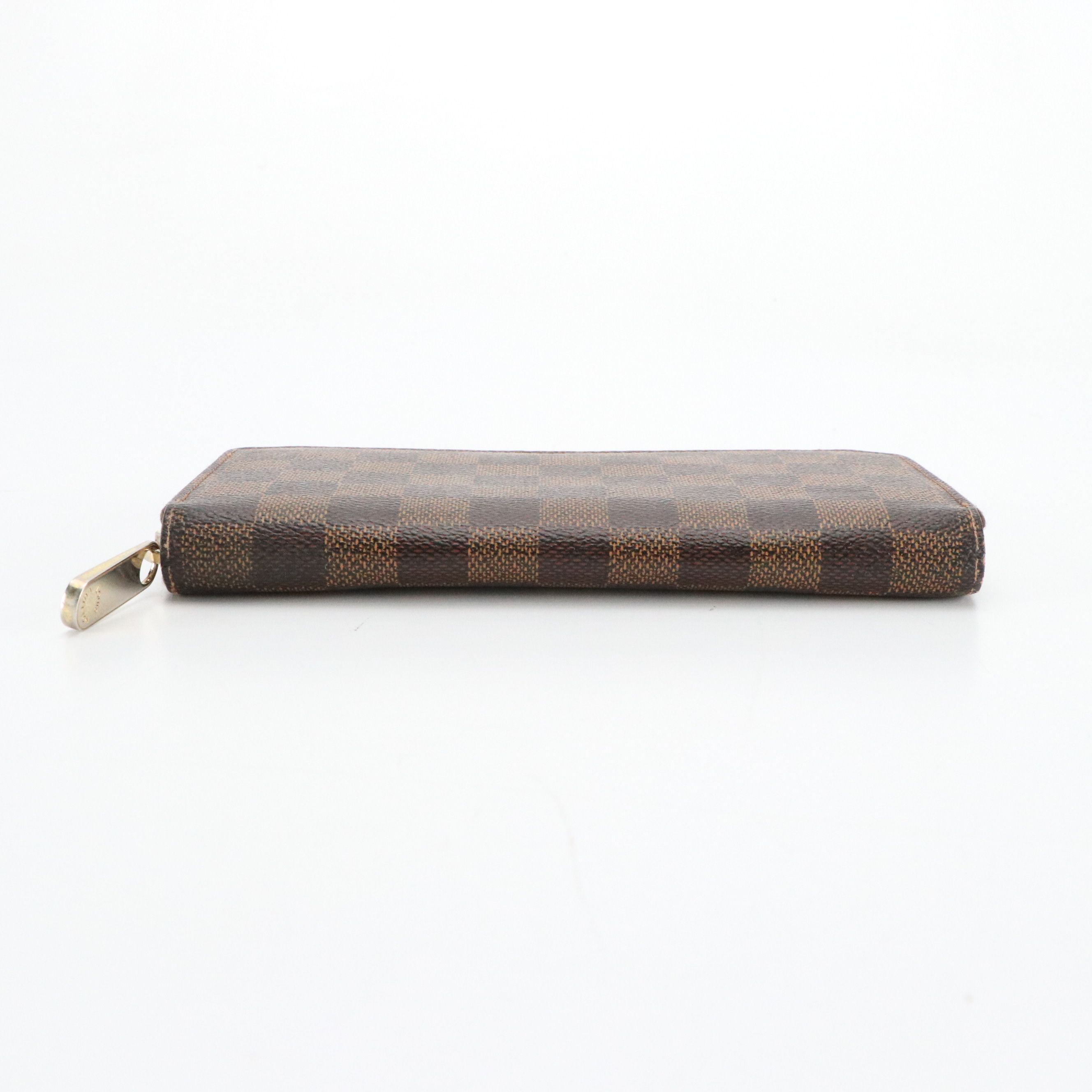 Louis Vuitton Zippy Wallet in Damier Ebene Canvas and Leather