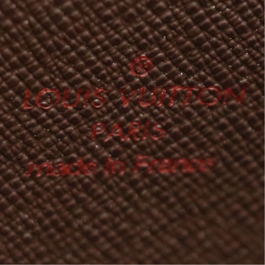 Louis Vuitton Zippy Wallet in Damier Ebene Canvas and Leather