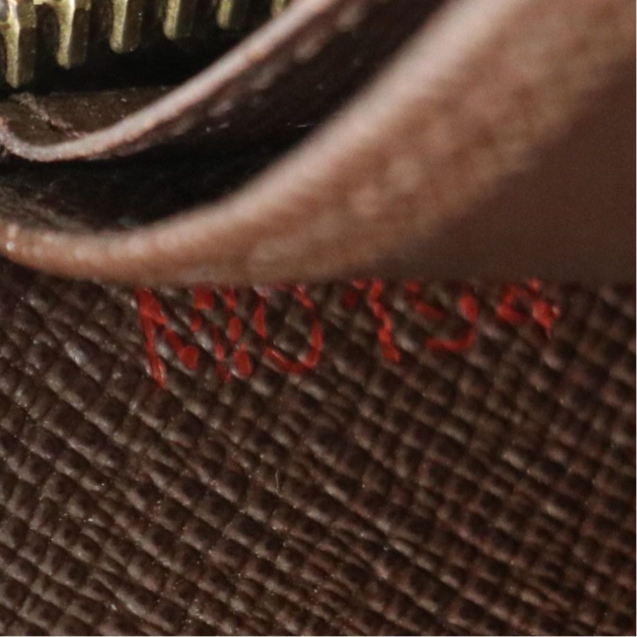 Louis Vuitton Zippy Wallet in Damier Ebene Canvas and Leather