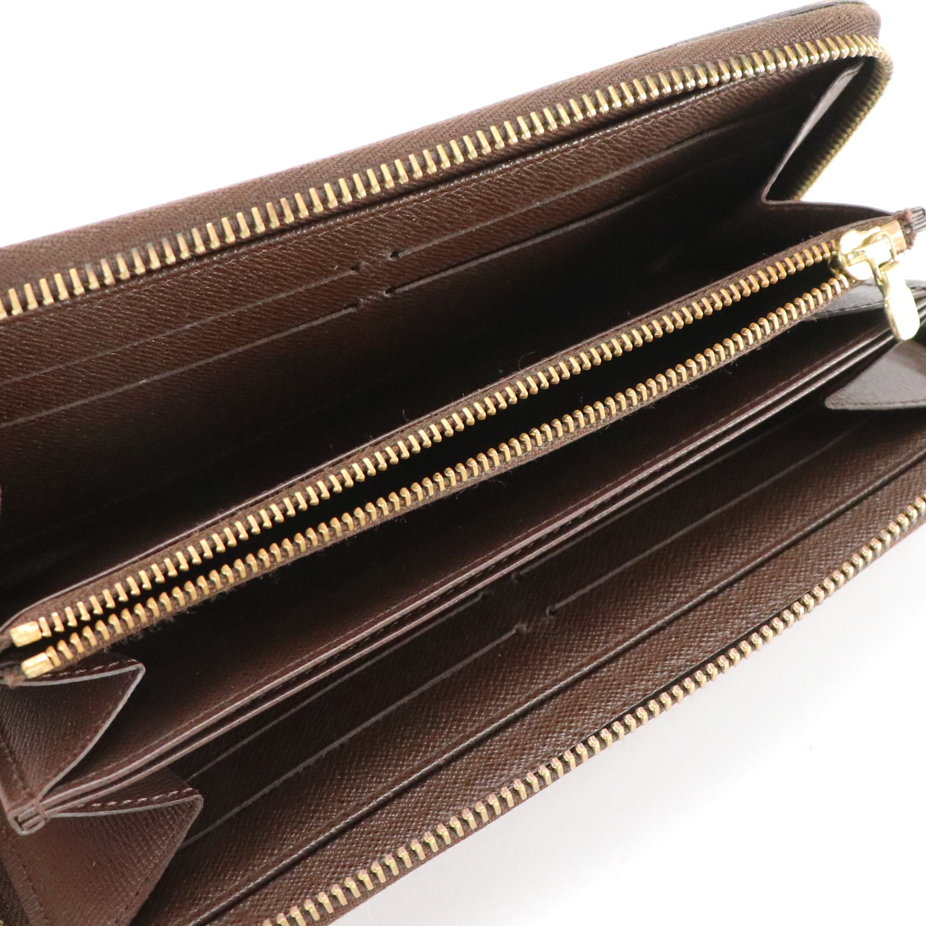 Louis Vuitton Zippy Wallet in Damier Ebene Canvas and Leather