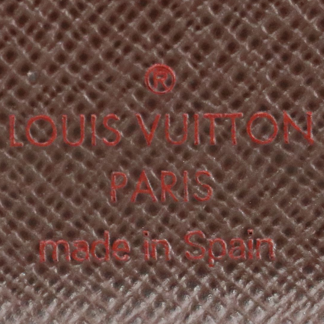 Louis Vuitton Multiple Bi-Fold Wallet in Monogram Canvas and Leather