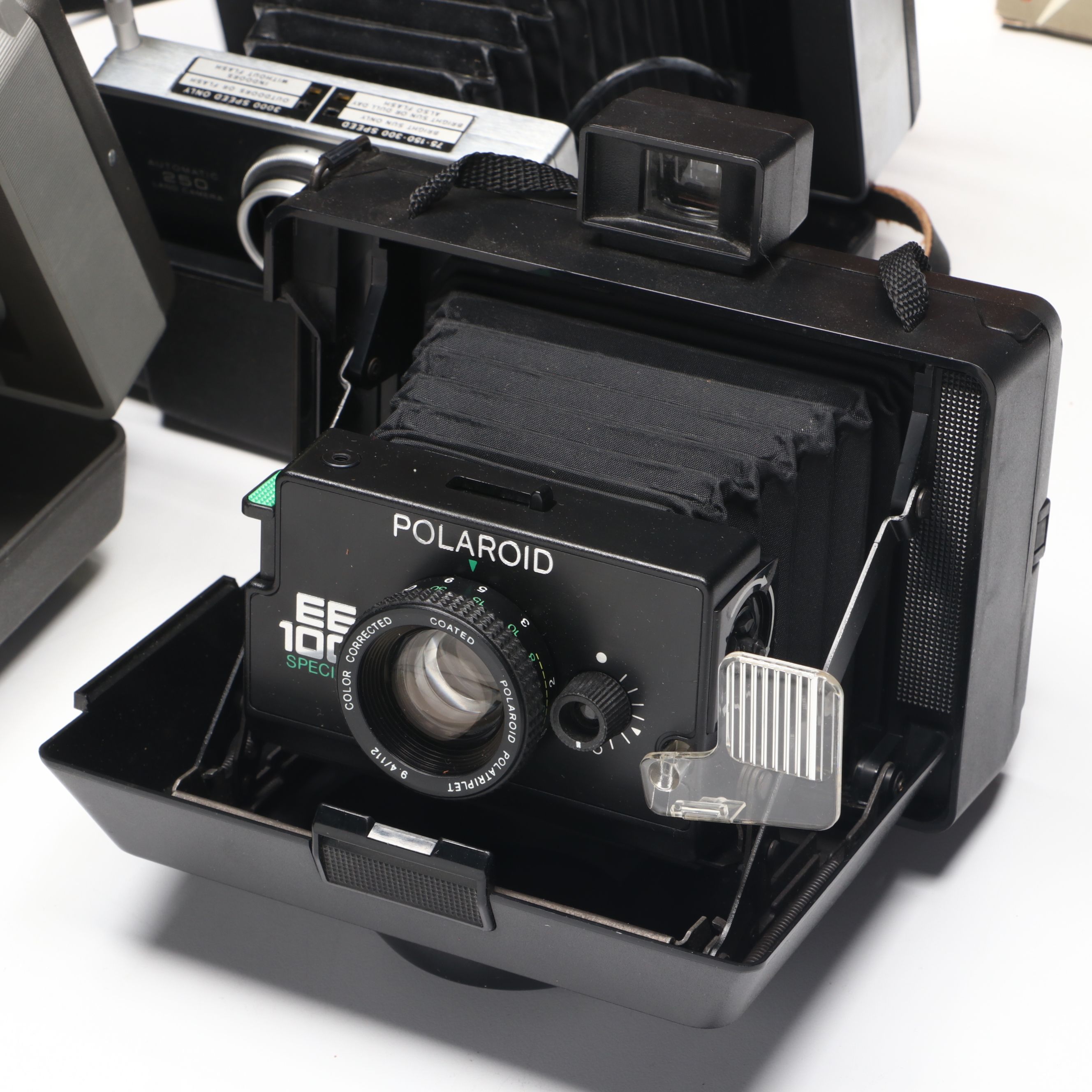 Polaroid Land Camera 150 in Case with More Folding Cameras, Mid to Late 20th C.