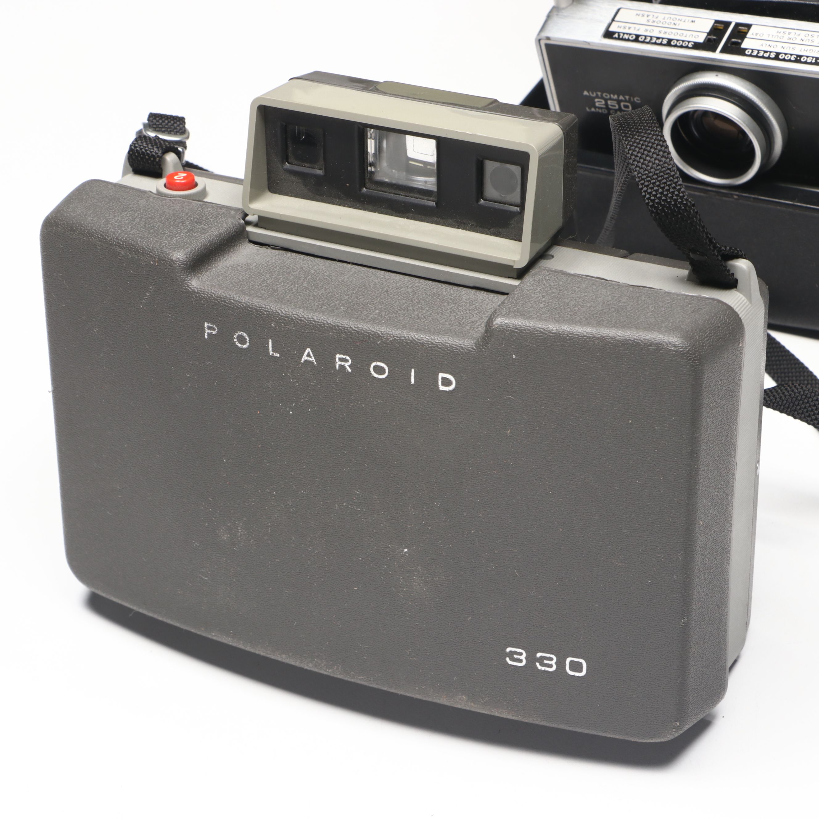 Polaroid Land Camera 150 in Case with More Folding Cameras, Mid to Late 20th C.
