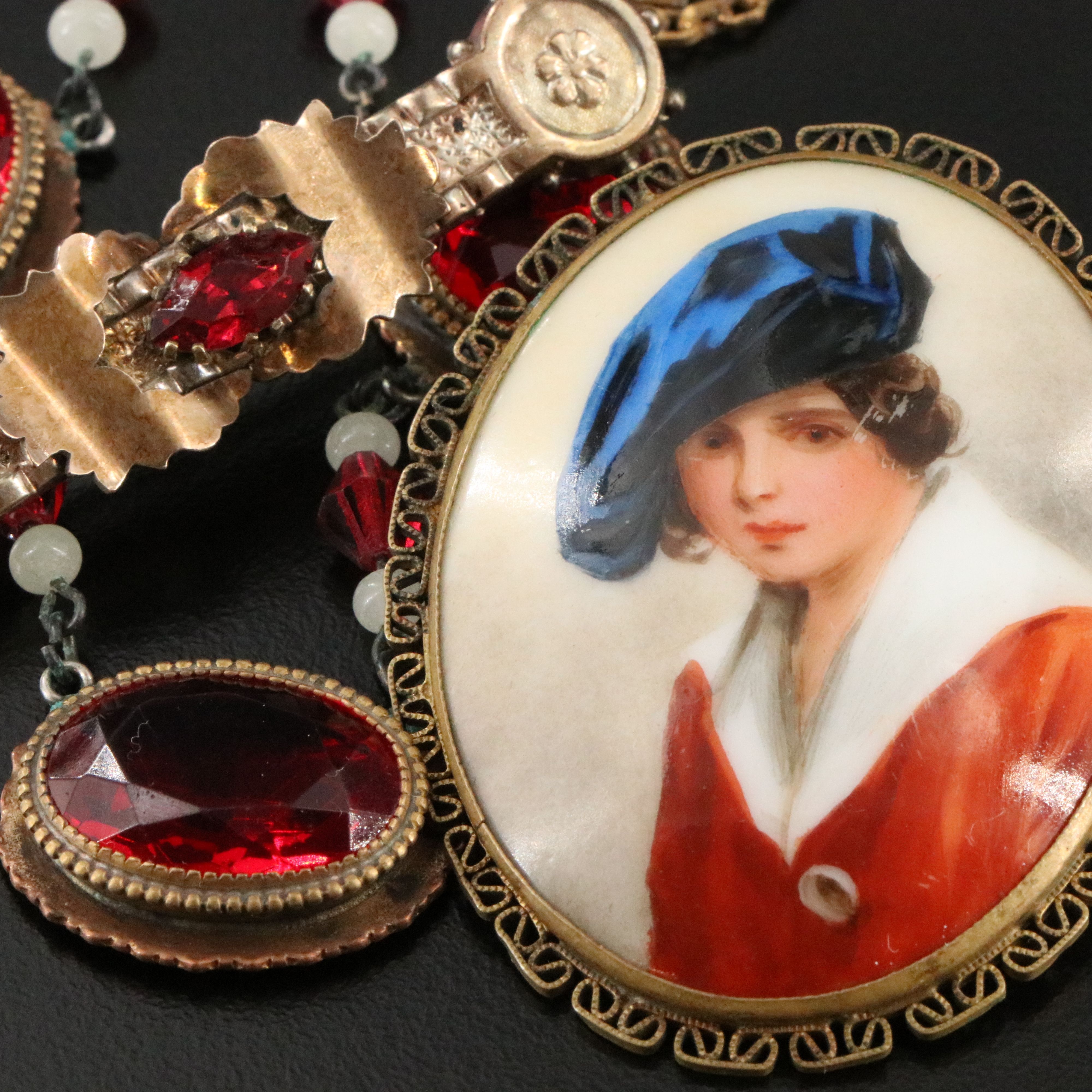Victorian Buckle Ring and Bar Pin Featured in Jewelry Collection with Ruby Glass
