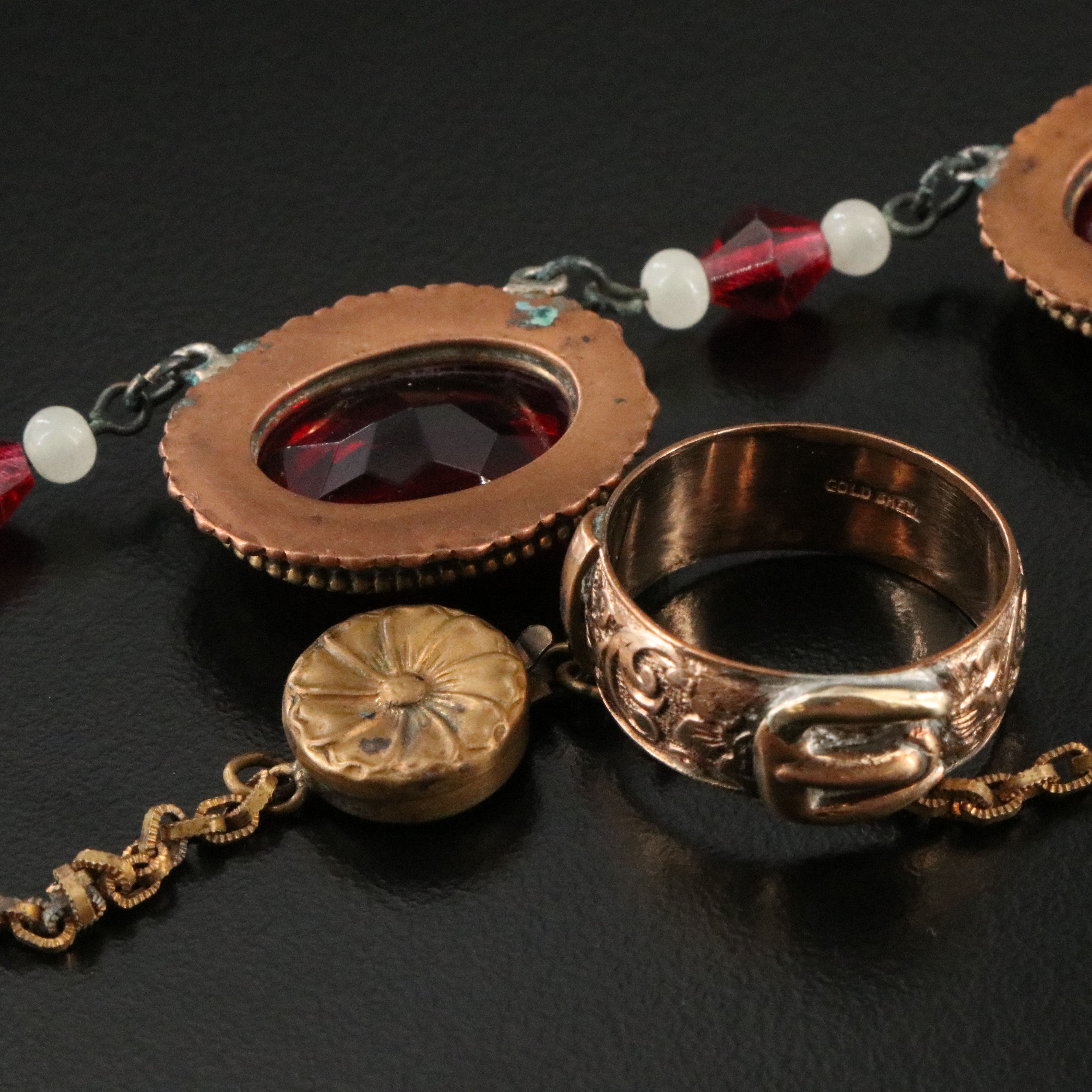 Victorian Buckle Ring and Bar Pin Featured in Jewelry Collection with Ruby Glass