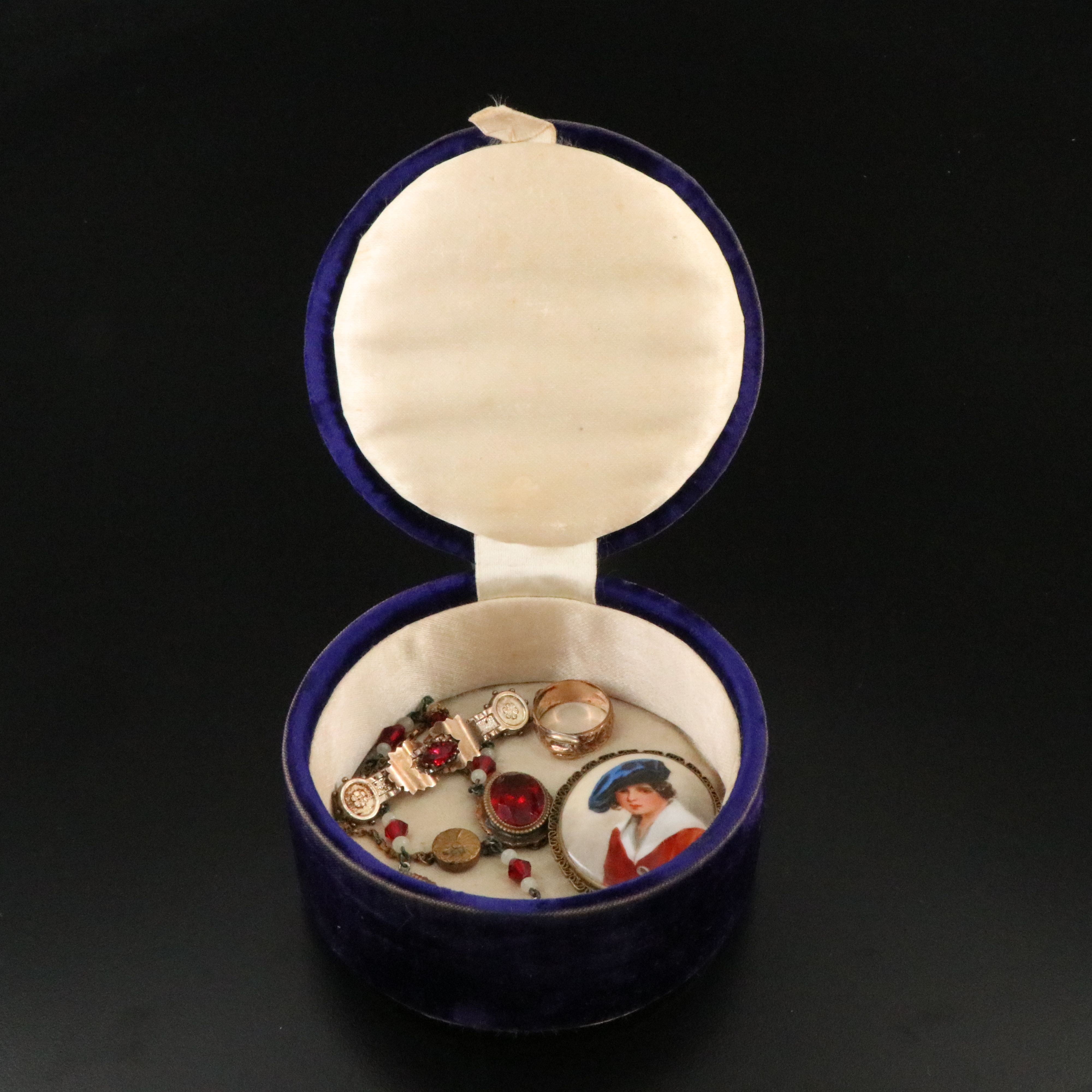 Victorian Buckle Ring and Bar Pin Featured in Jewelry Collection with Ruby Glass