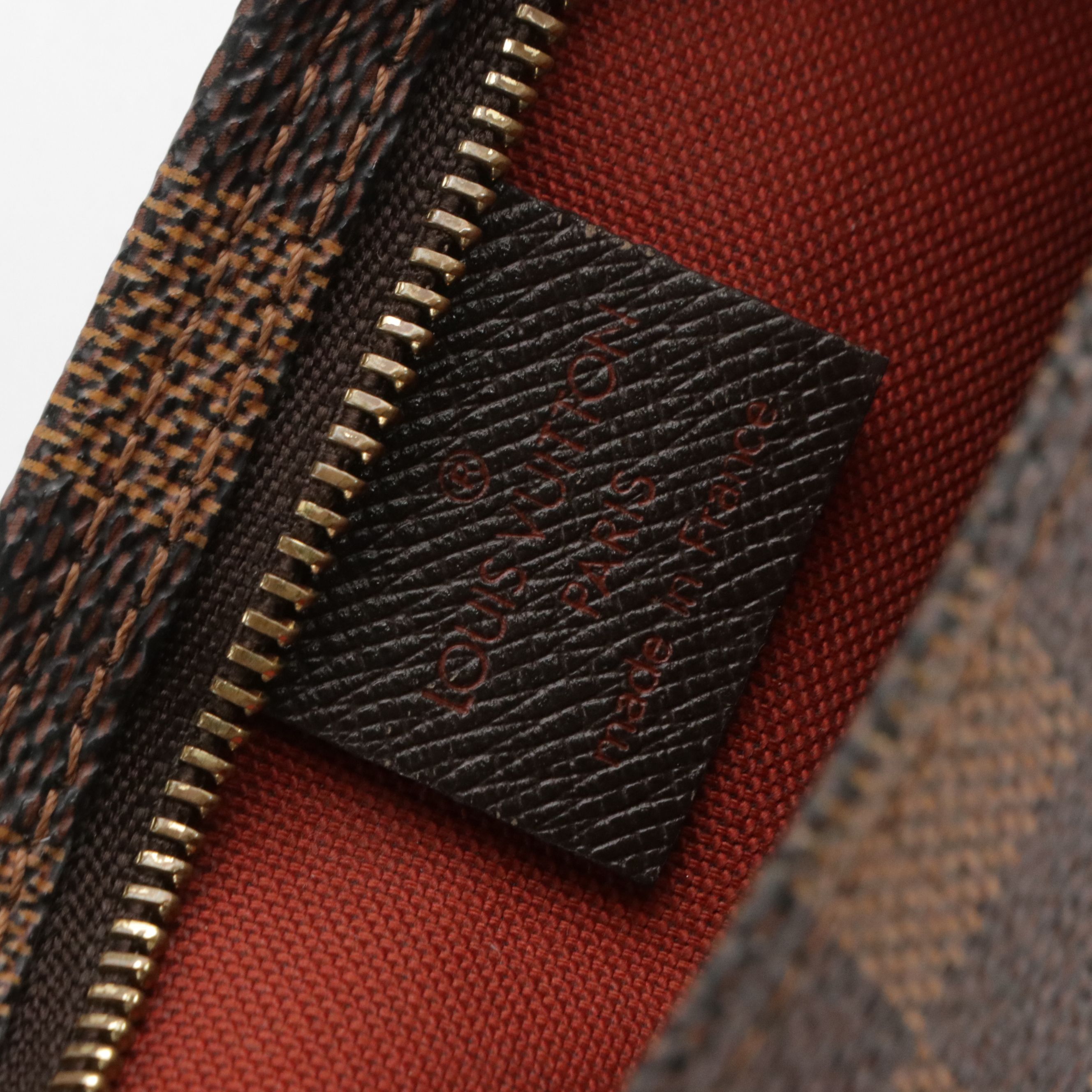 Louis Vuitton Trousse Pochette Bag in Damier Ebene Canvas and Leather