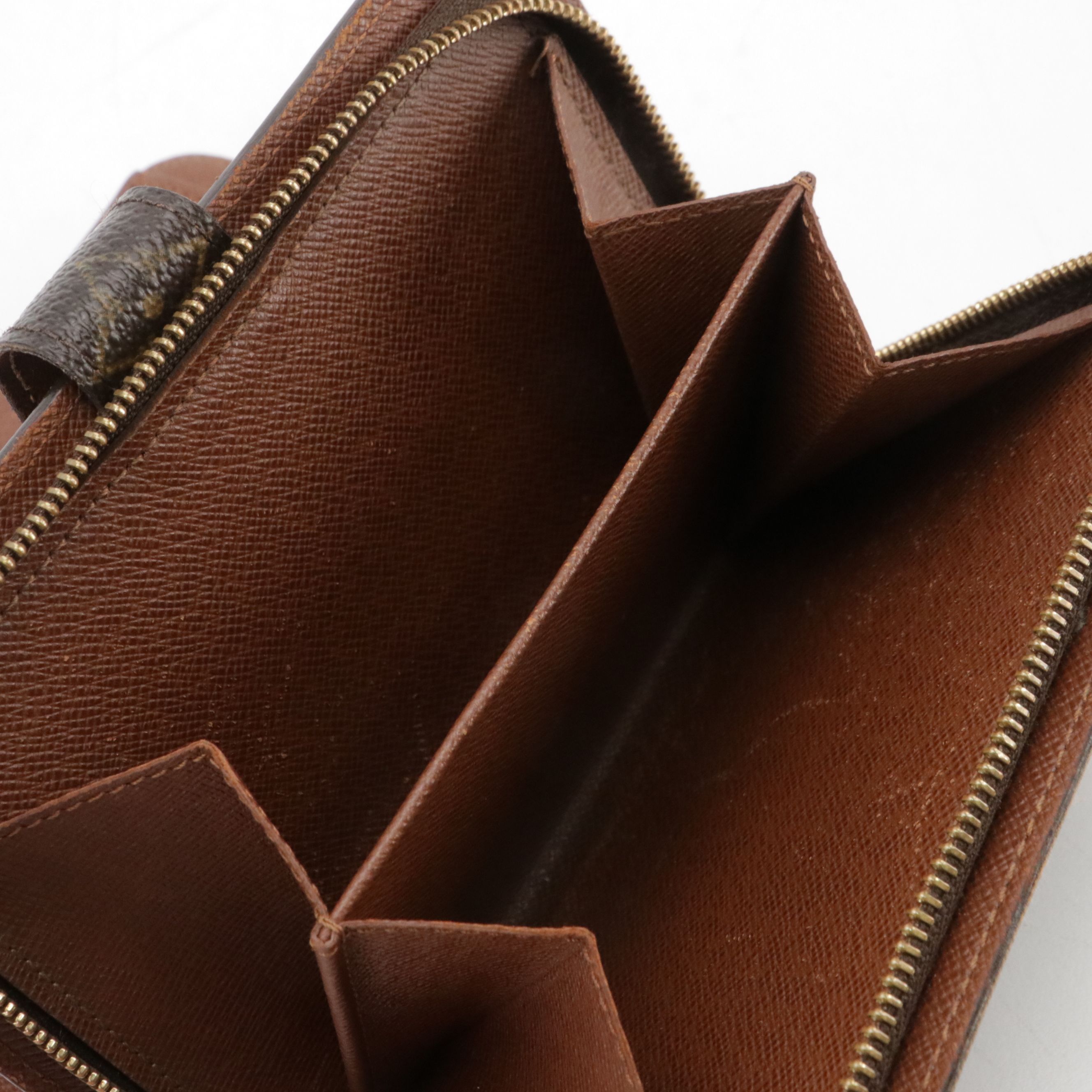 Louis Vuitton Porte-Papier Zippé Bifold Wallet in Monogram Canvas and Leather