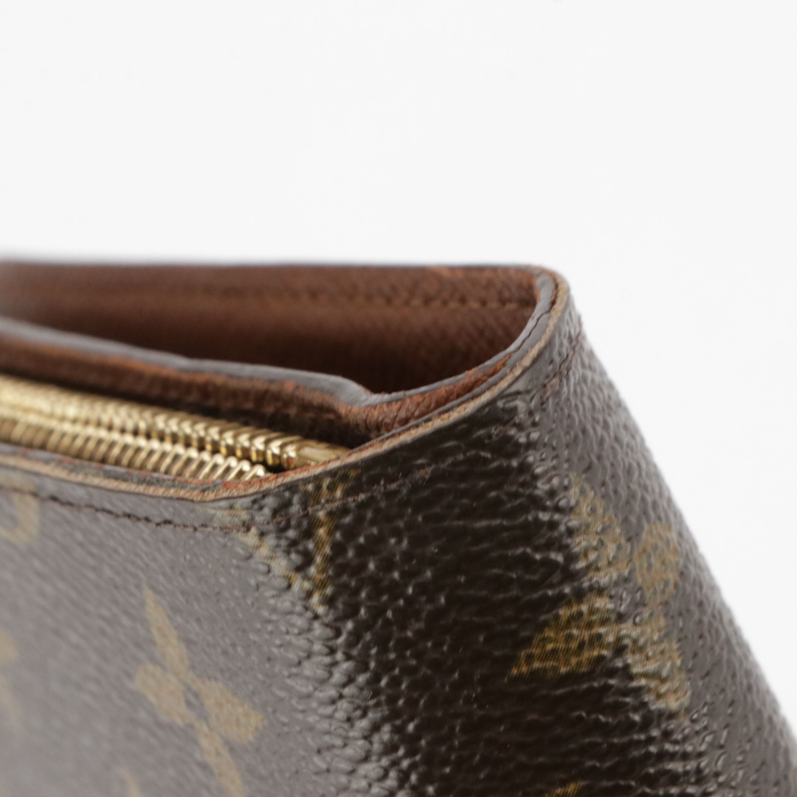 Louis Vuitton Porte-Papier Zippé Bifold Wallet in Monogram Canvas and Leather