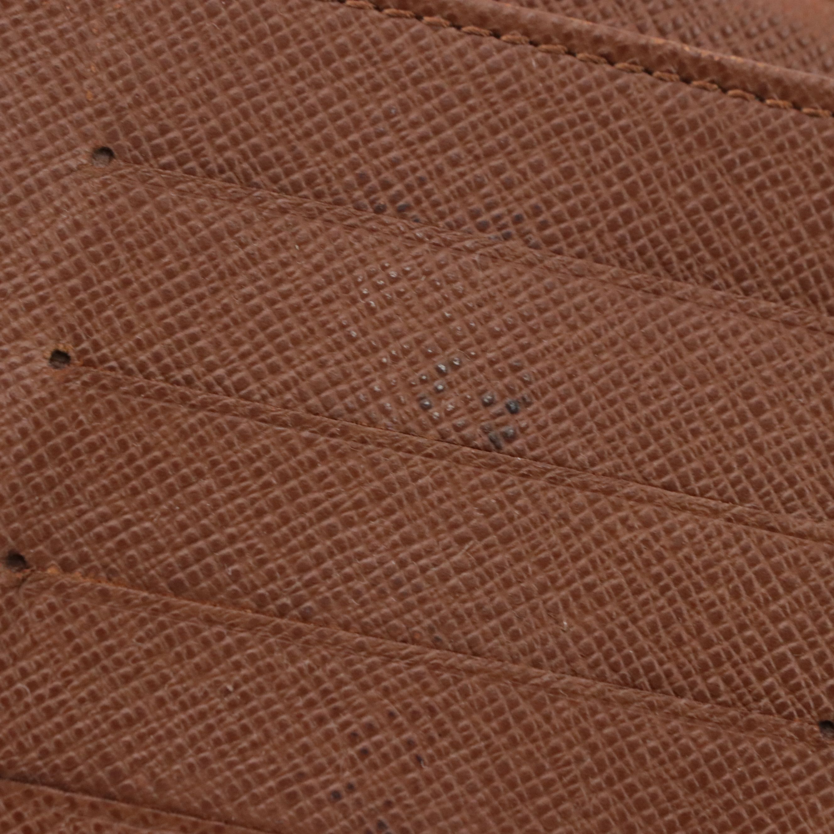 Louis Vuitton Porte-Papier Zippé Bifold Wallet in Monogram Canvas and Leather