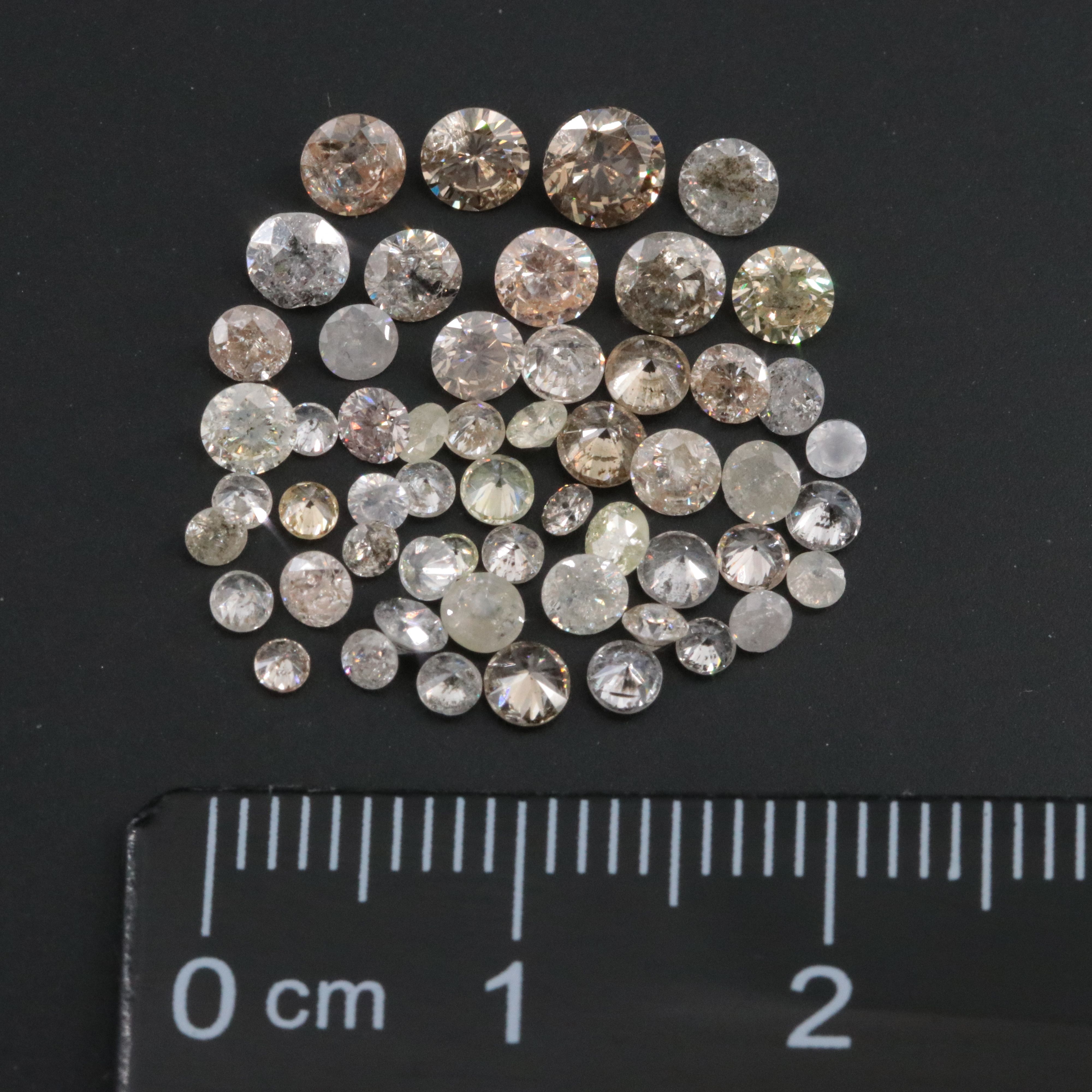 Loose 4.46 CTW Diamond Melee Lot Including Fancy Colors