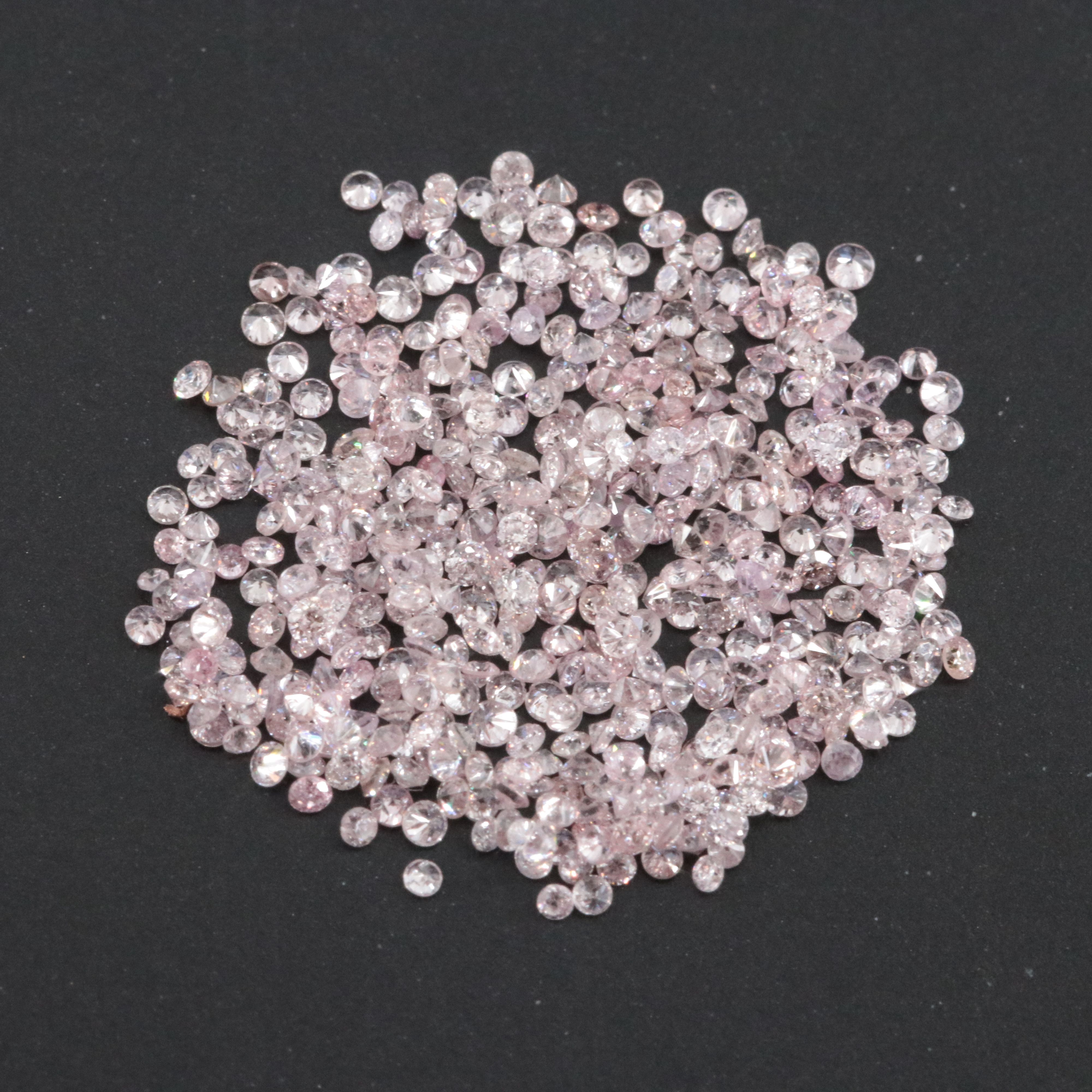 Loose 1.01 CTW Diamond Lot Including Fancy Pink
