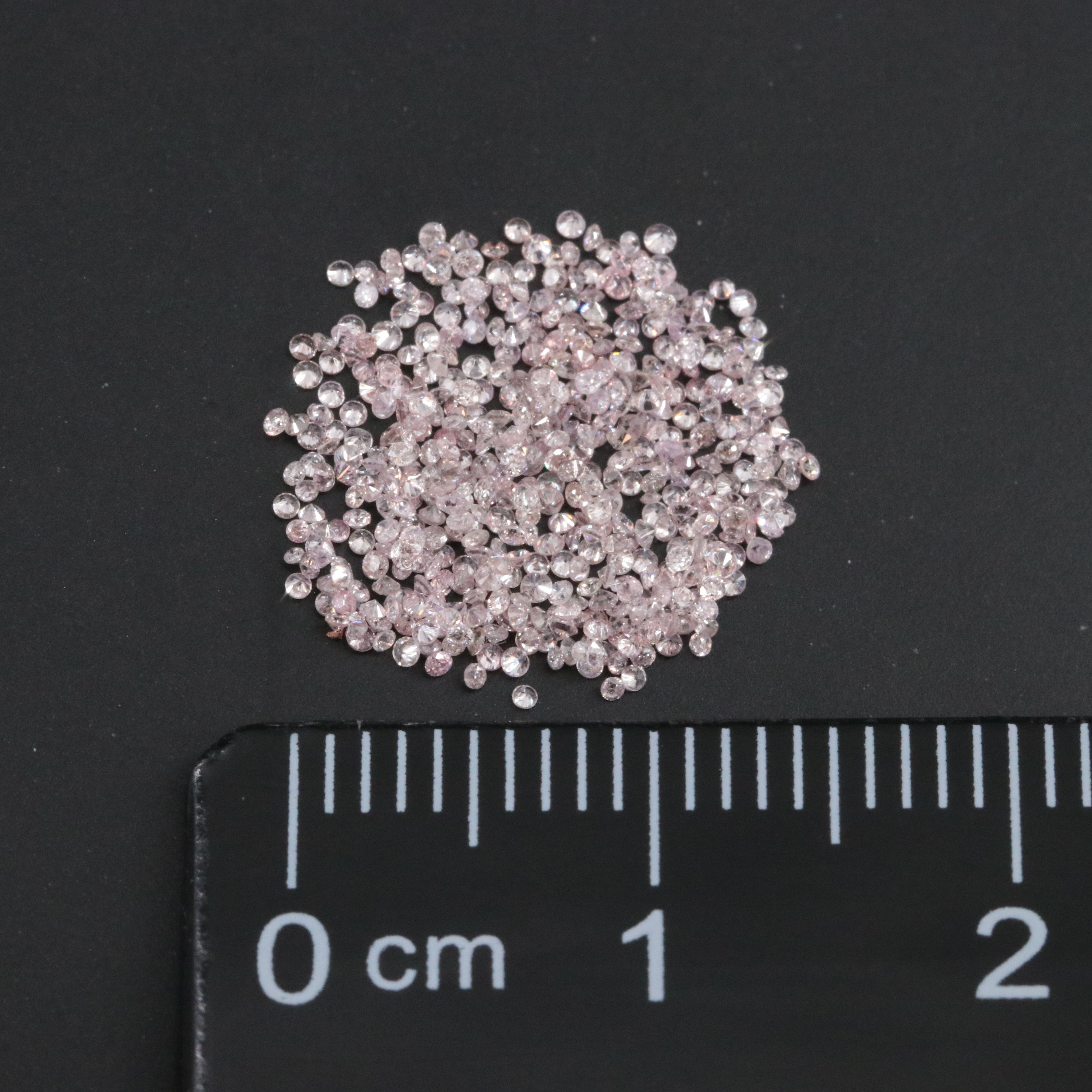 Loose 1.01 CTW Diamond Lot Including Fancy Pink