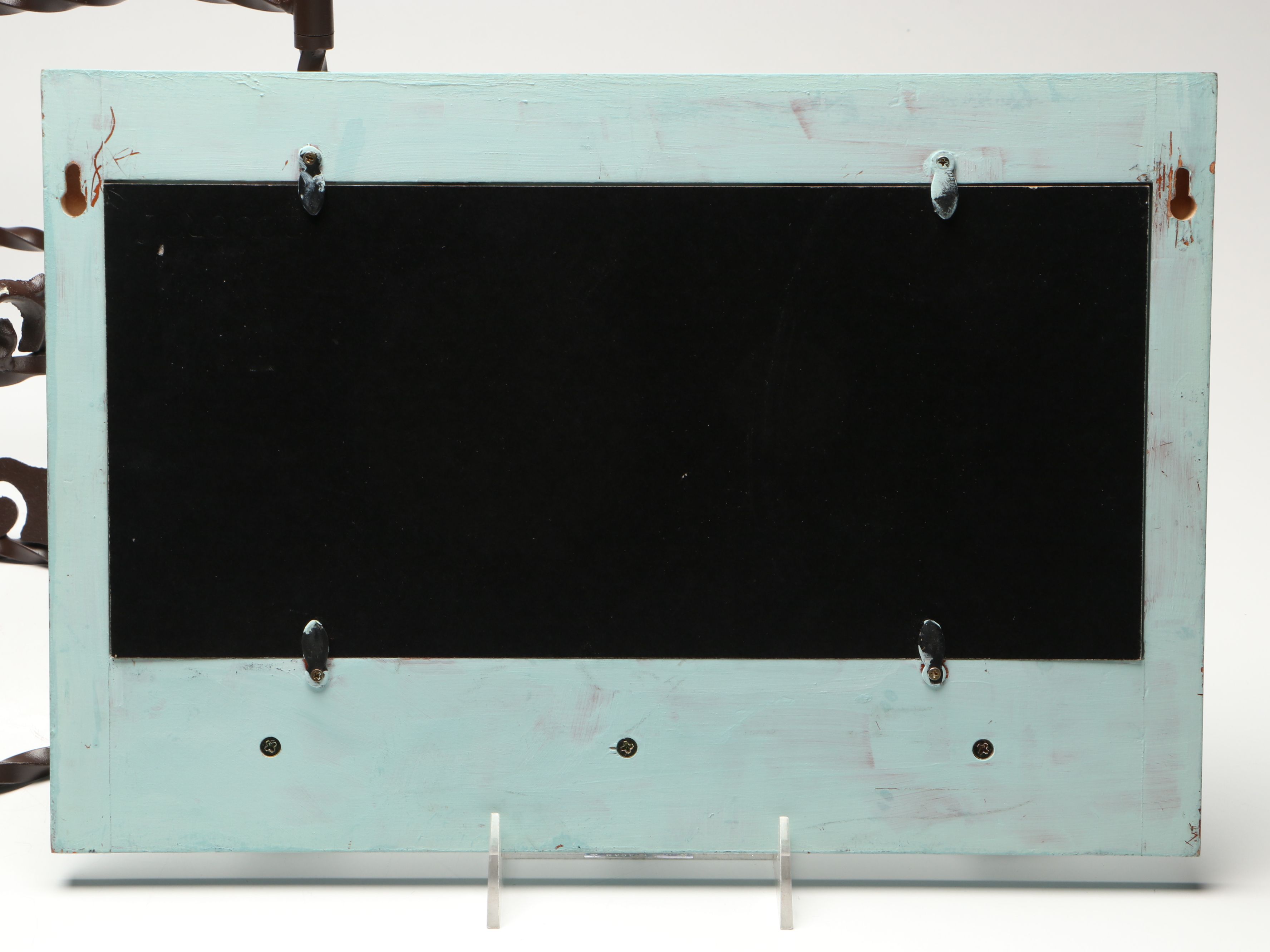 Tiered Cast Metal Plant Stand with Wooden Signs and Other Rustic Style Décor