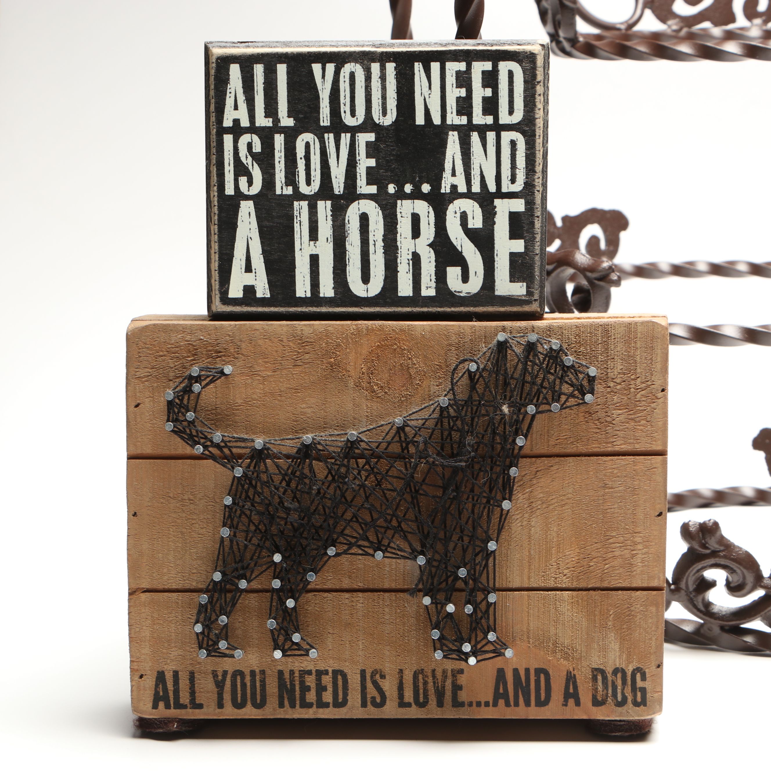 Tiered Cast Metal Plant Stand with Wooden Signs and Other Rustic Style Décor