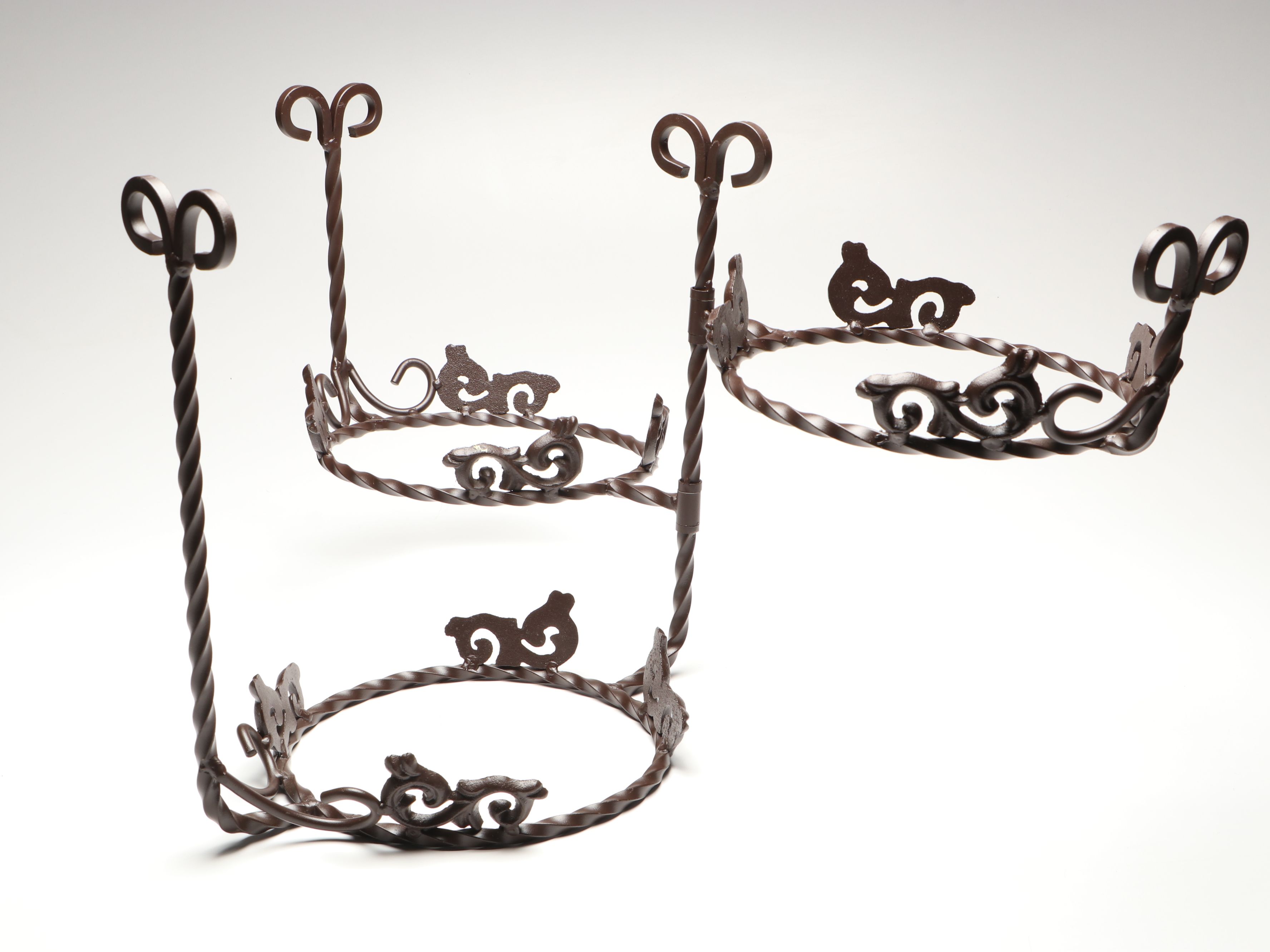 Tiered Cast Metal Plant Stand with Wooden Signs and Other Rustic Style Décor