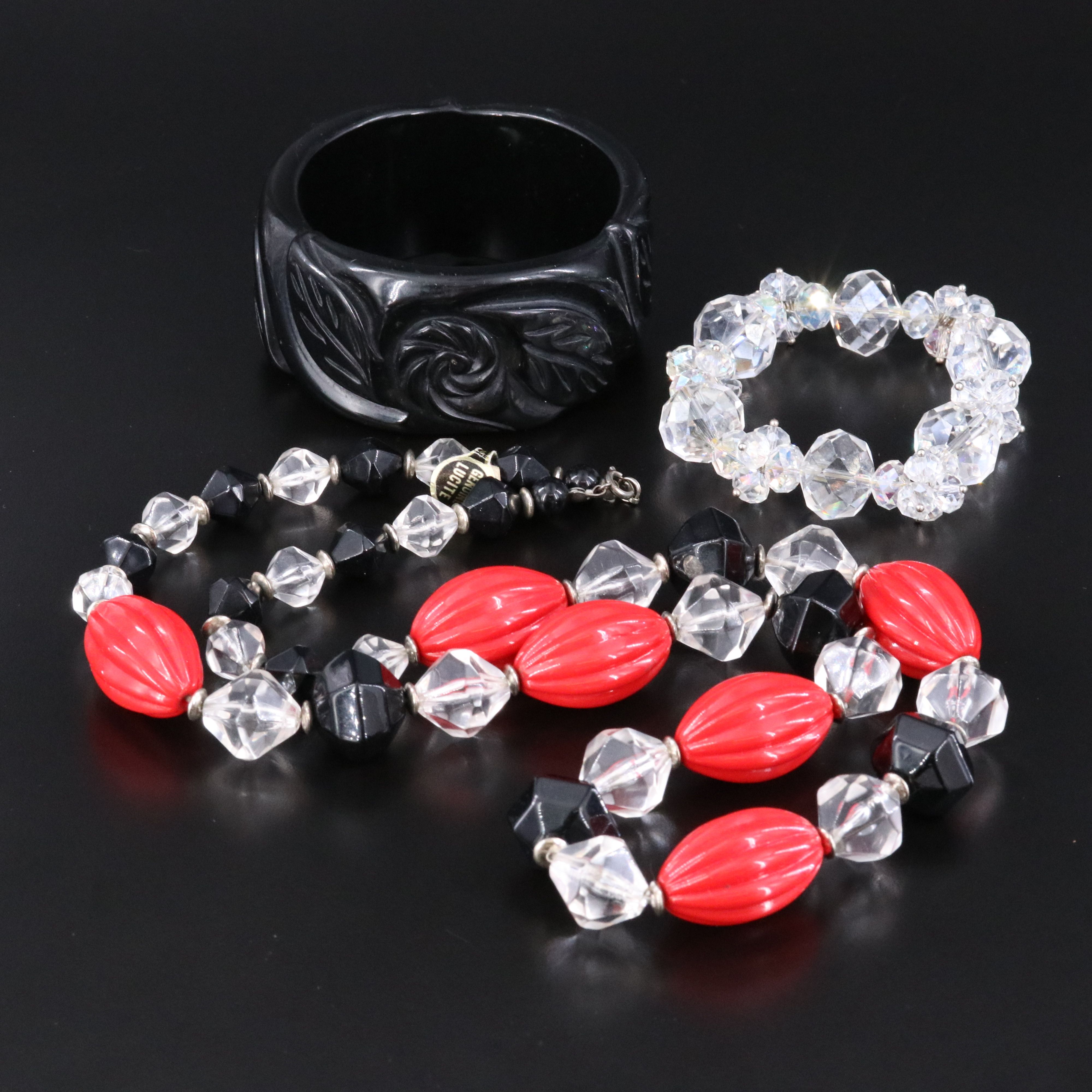 Vintage Lucite and Carved Bangle Featured in Necklace and Bracelet Selection