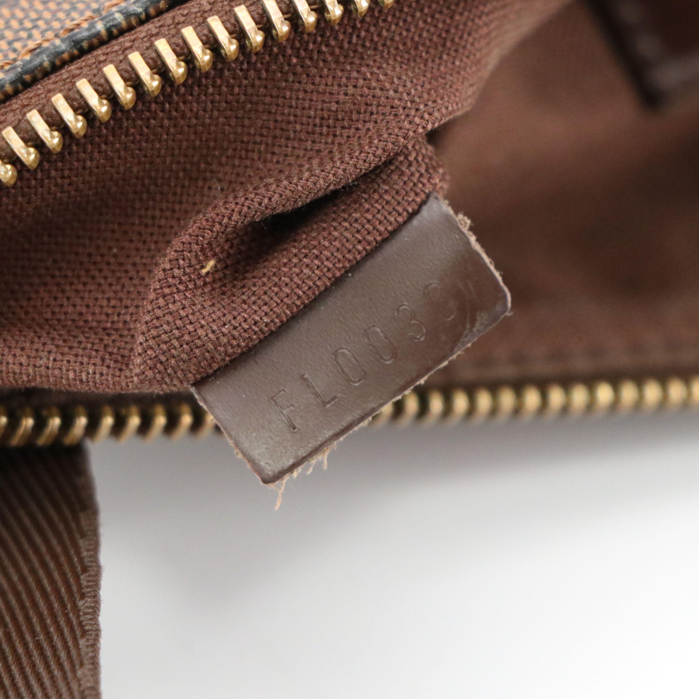 Louis Vuitton Pochette Melville Crossbody Bag in Damier Ebene Canvas