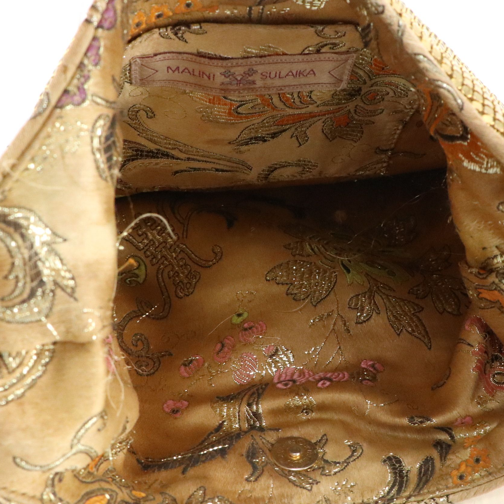 Malini Sulaika Gold Tone Mesh Bag and Thomas Wylde Chain Link Belt