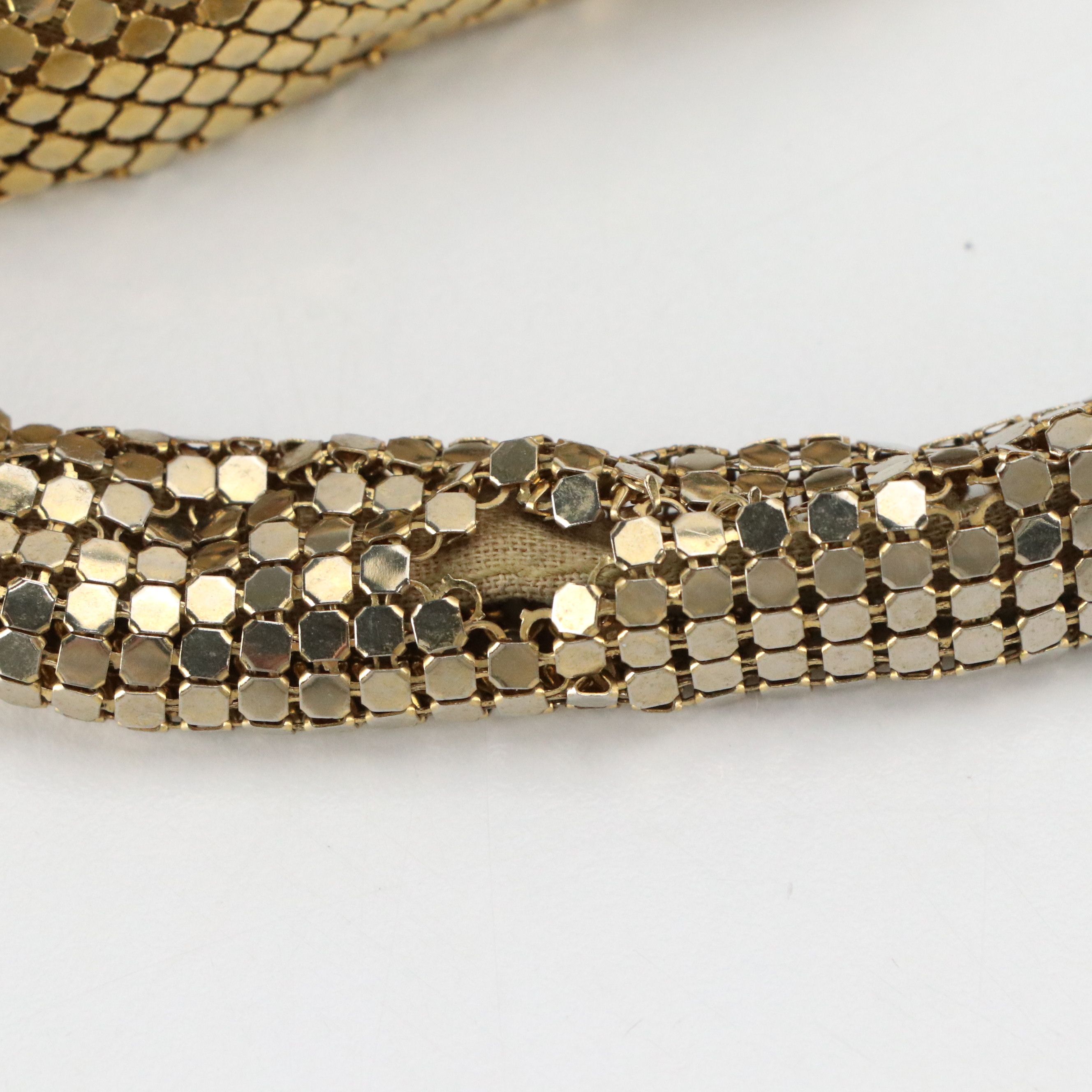 Malini Sulaika Gold Tone Mesh Bag and Thomas Wylde Chain Link Belt